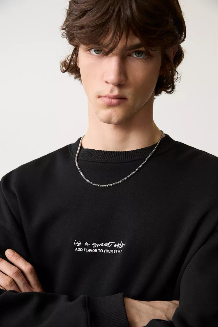 Boxy fit sweatshirt with Is a Sweet Color written