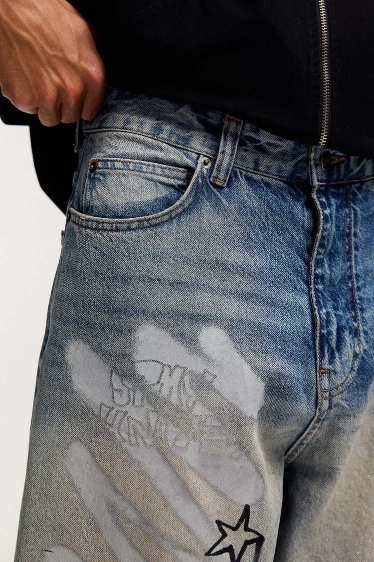 STWD graffiti patterned skater jeans