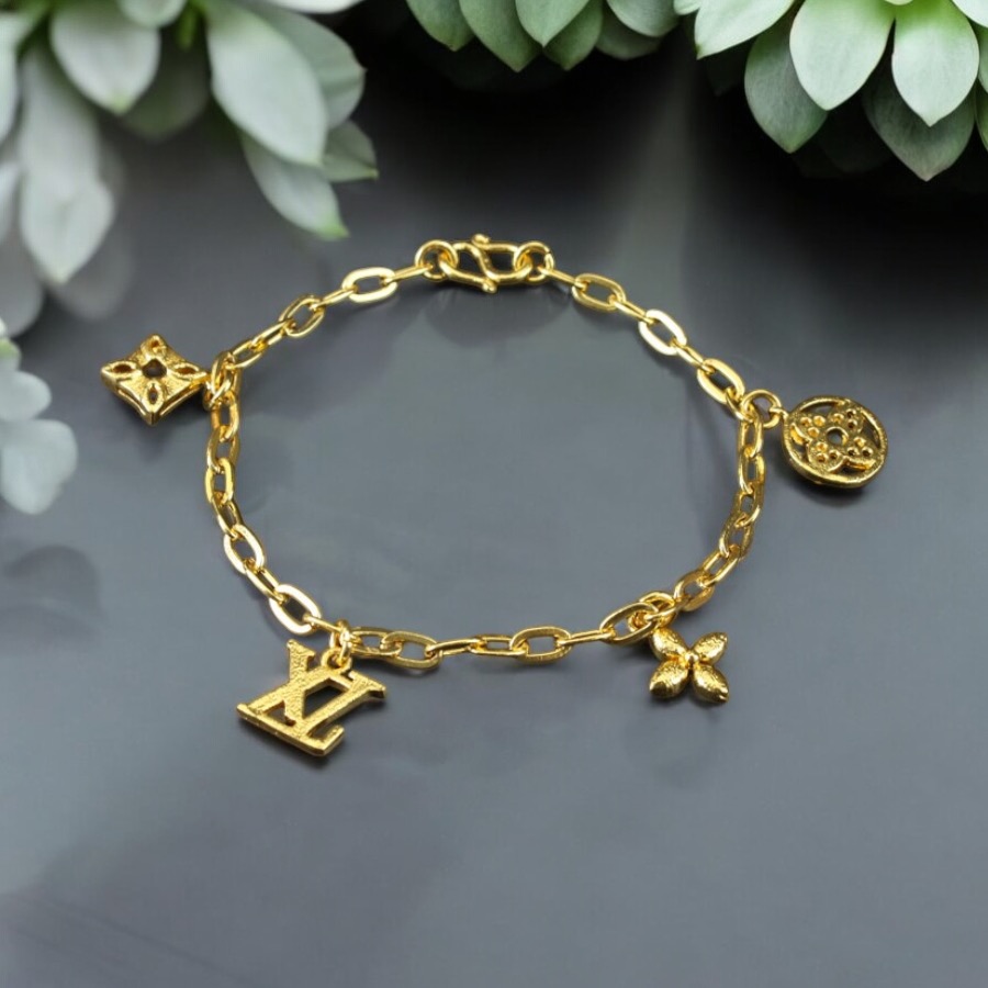 Gold Dangling Designer Charm Bracelet