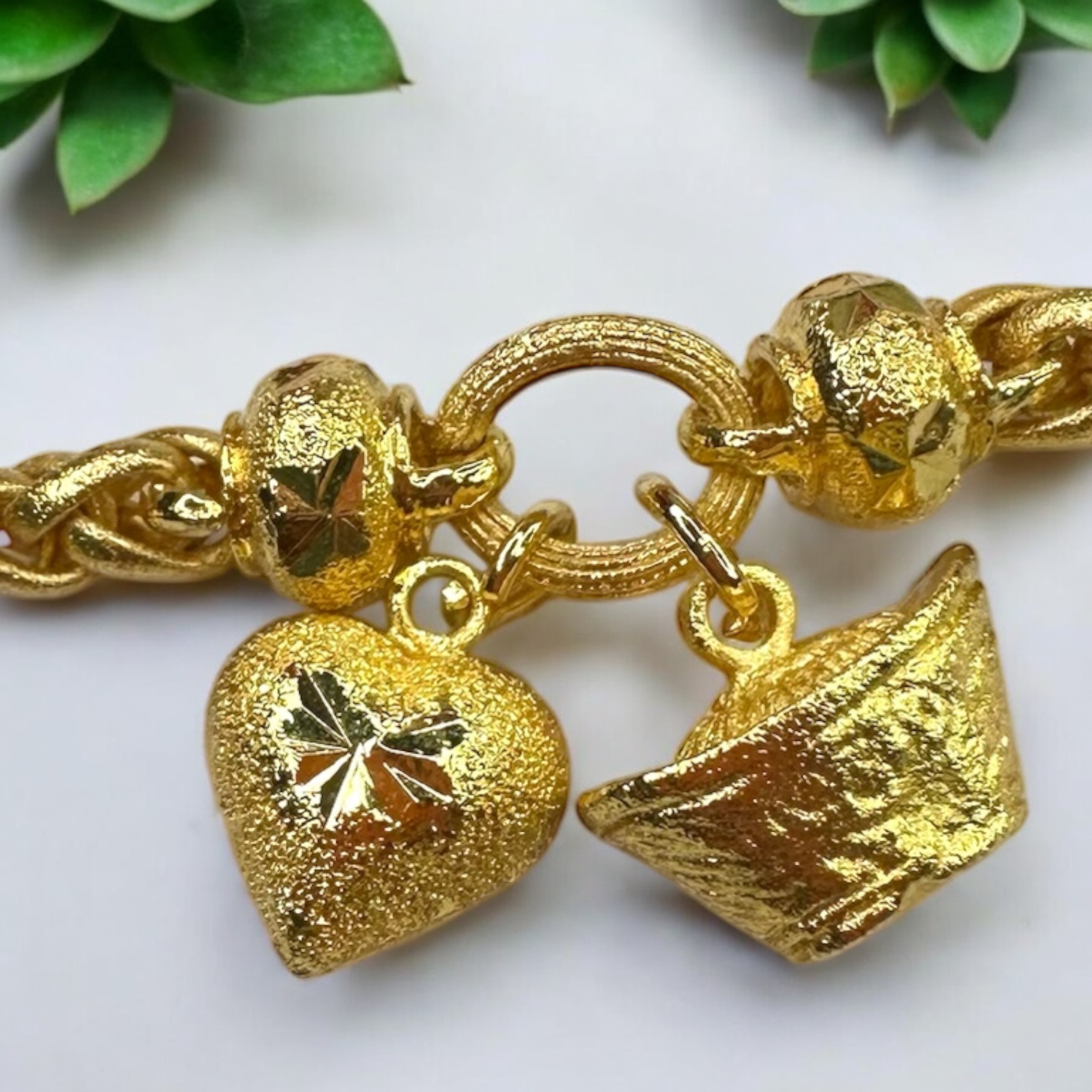 Gold Money Bag and Heart Bracelet