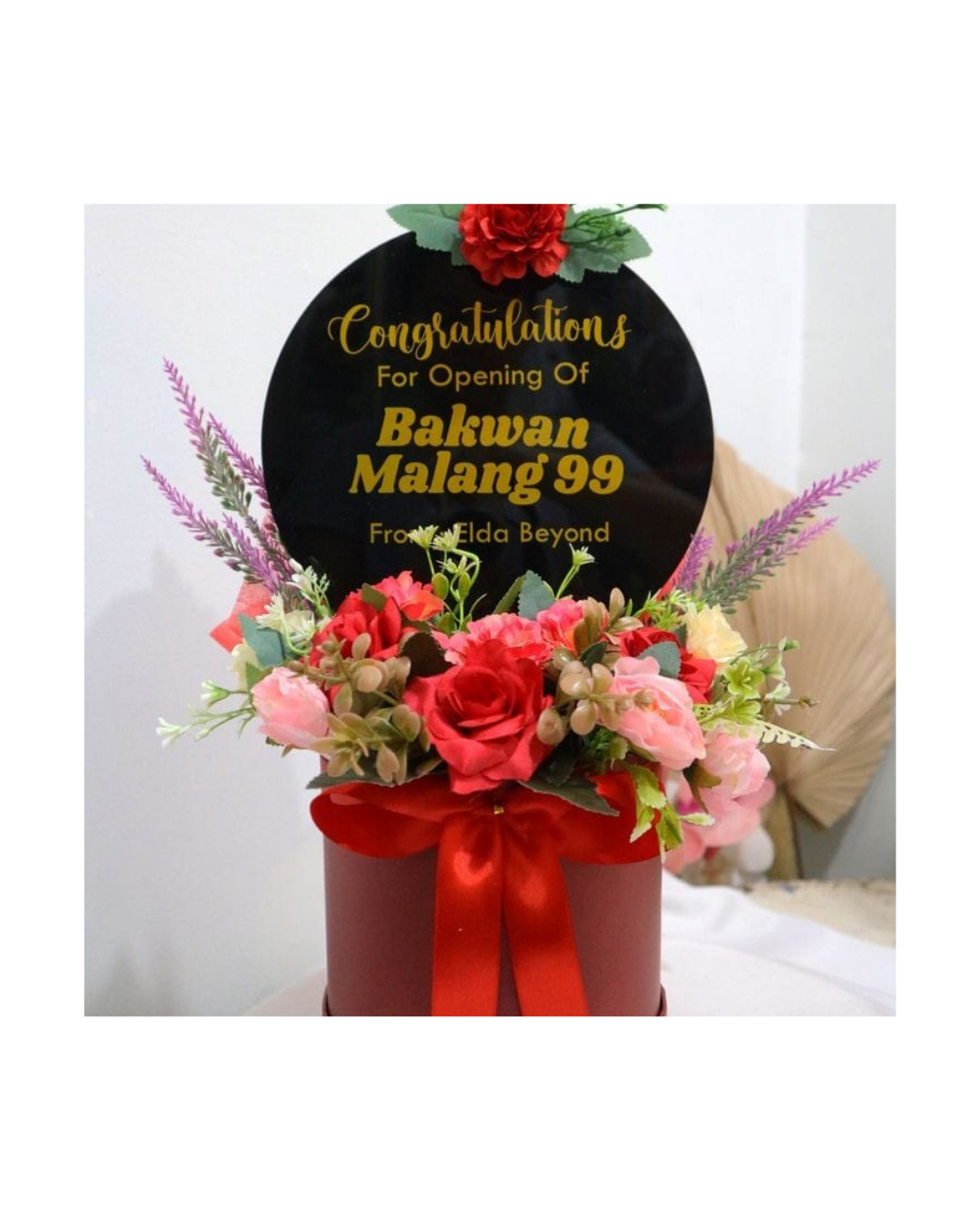 Flower Arrangement in Red Vase