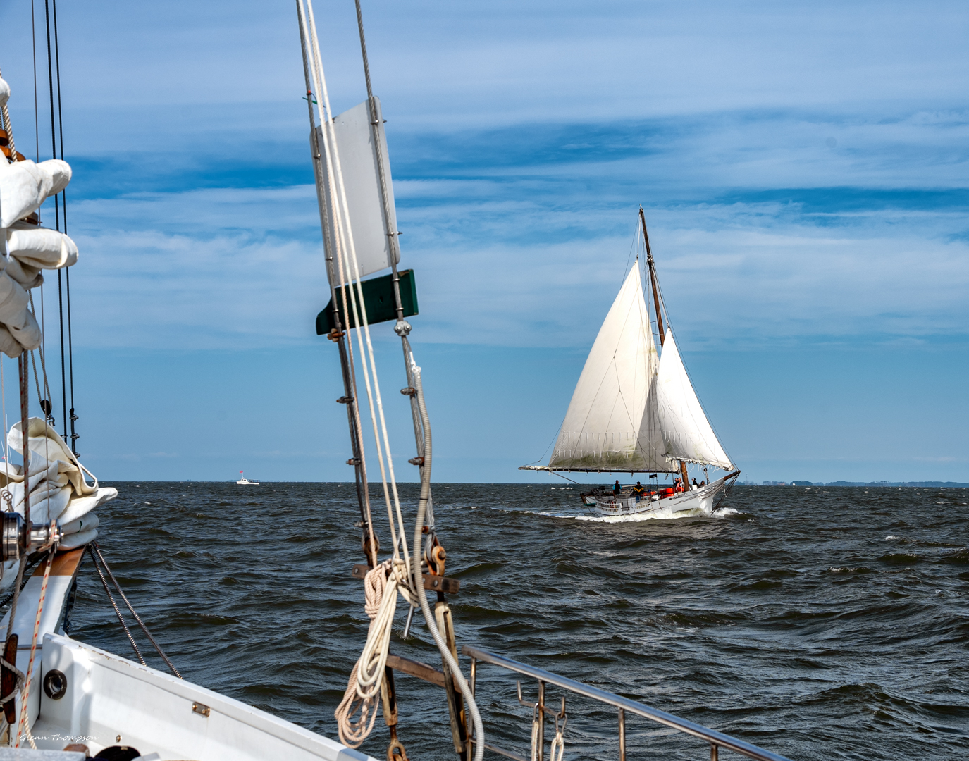 The Skipjack H.M. Krentz sailing the Deal Island Skipjack Race  from the Deck of the Skipjack Wilma Lee 