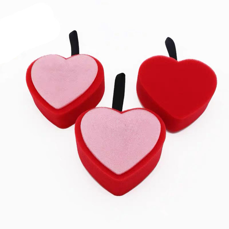 Heart-shaped bath sponge