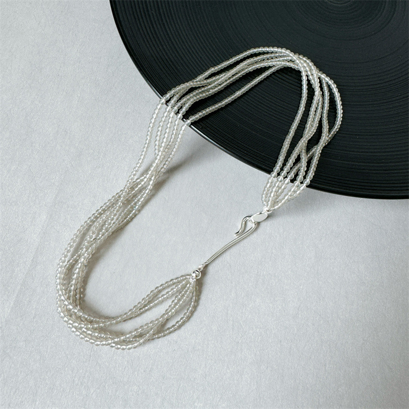 Celestara – Multi-Layer Crystal Bead & Silver-Tone Necklace