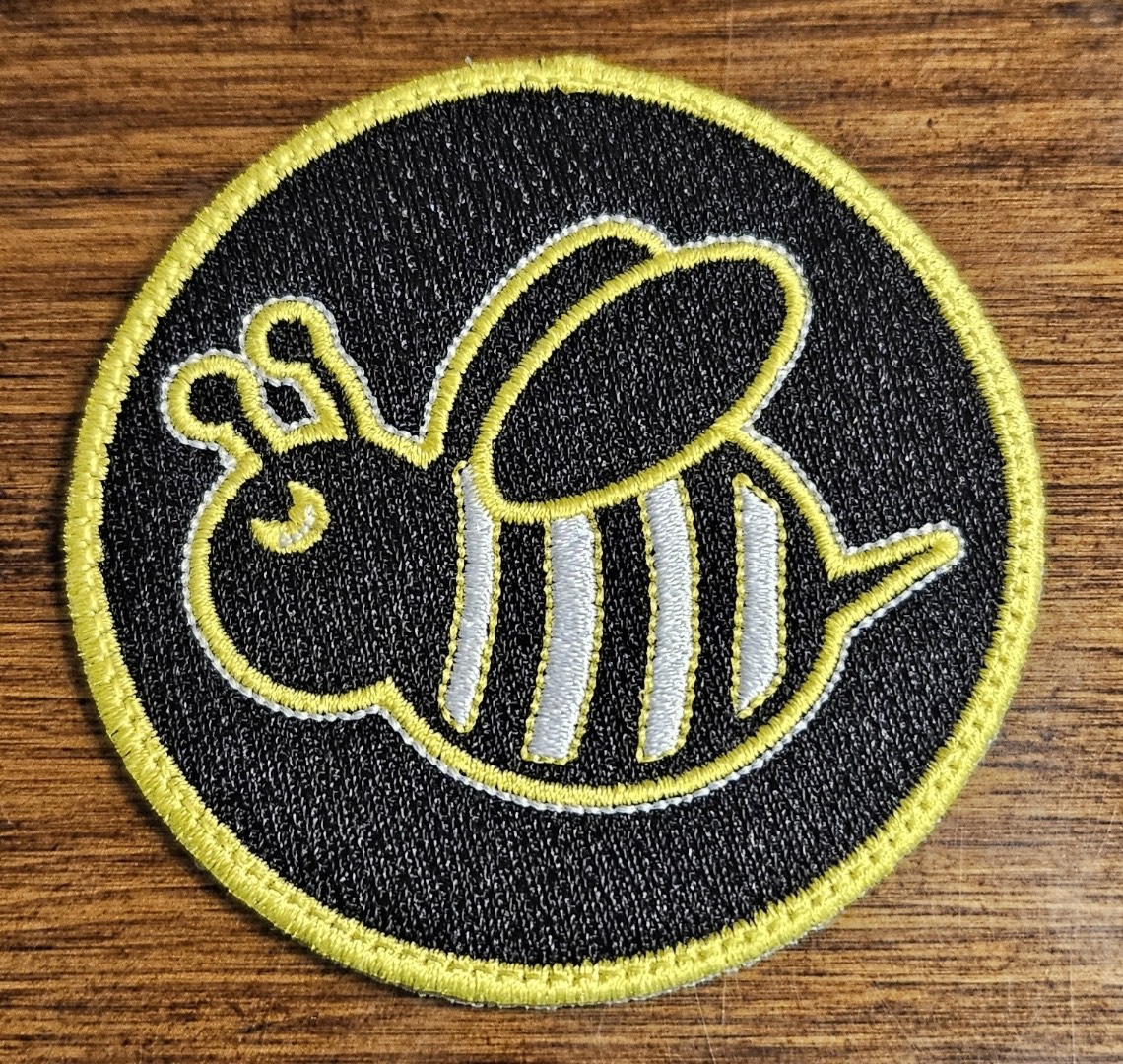 "The Hive" Bee woven iron-on patch