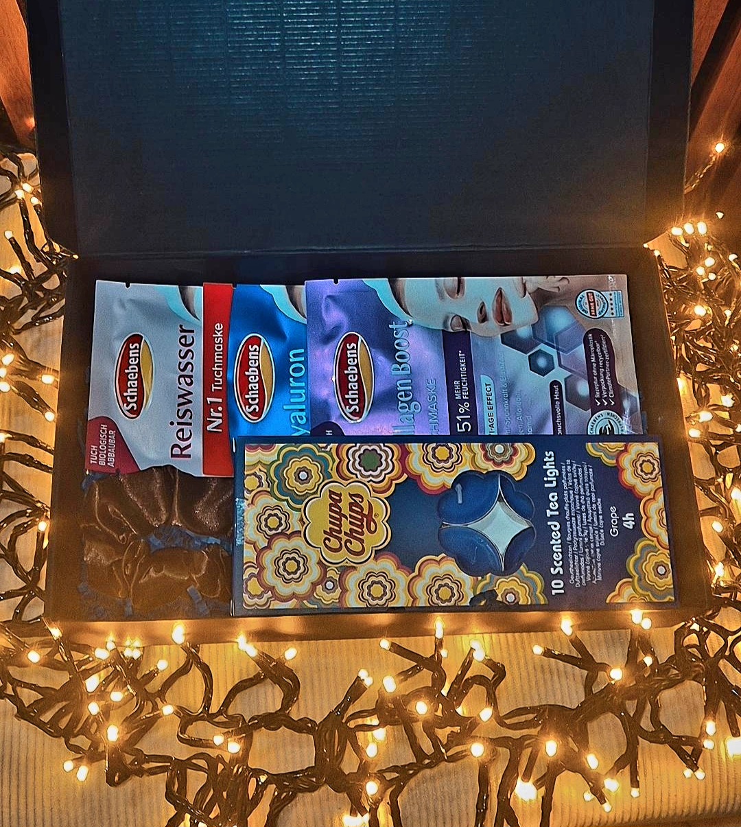 Dovanų rinkinys su veido kaukėmis ir žvakėmis