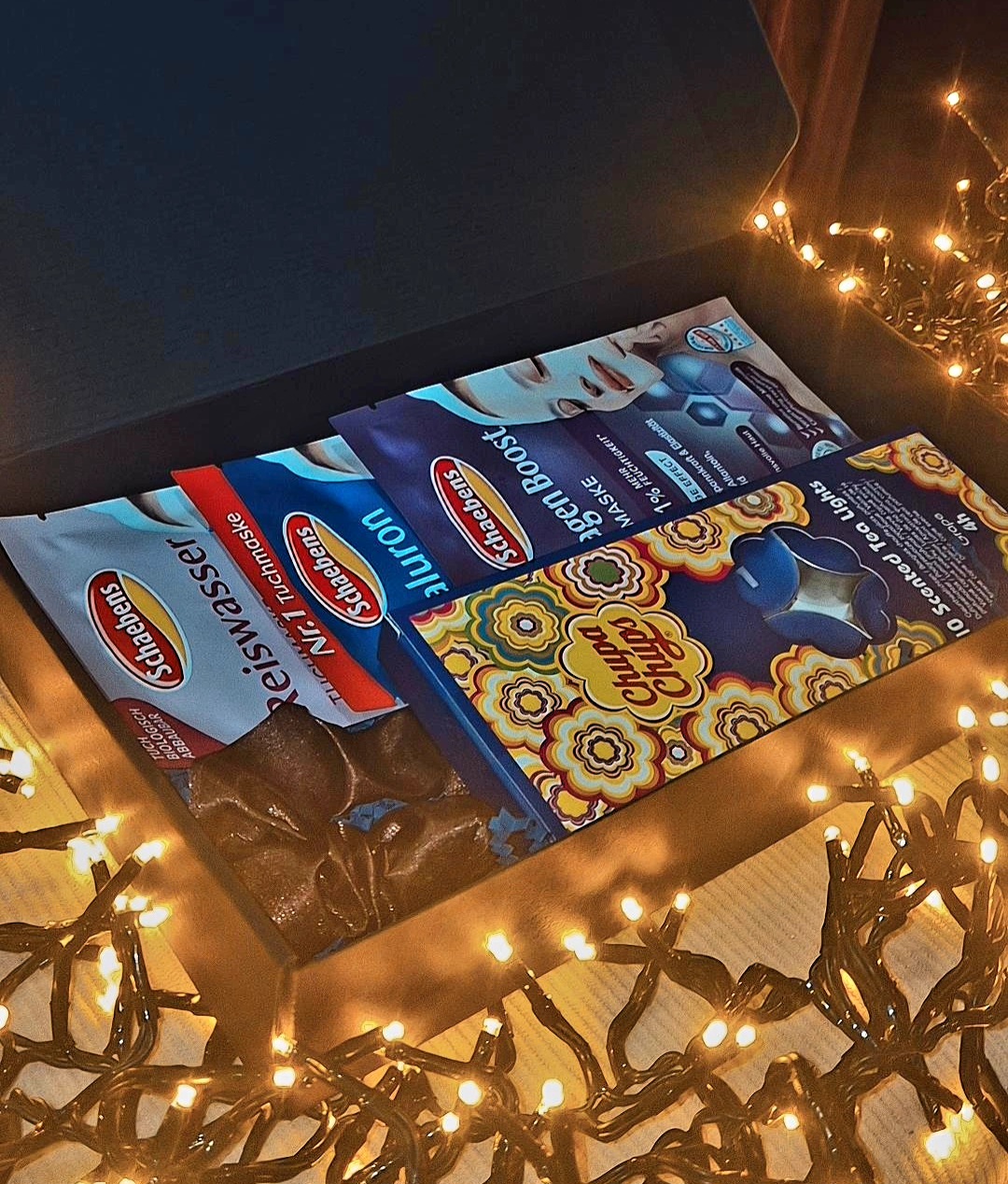 Dovanų rinkinys su veido kaukėmis ir žvakėmis