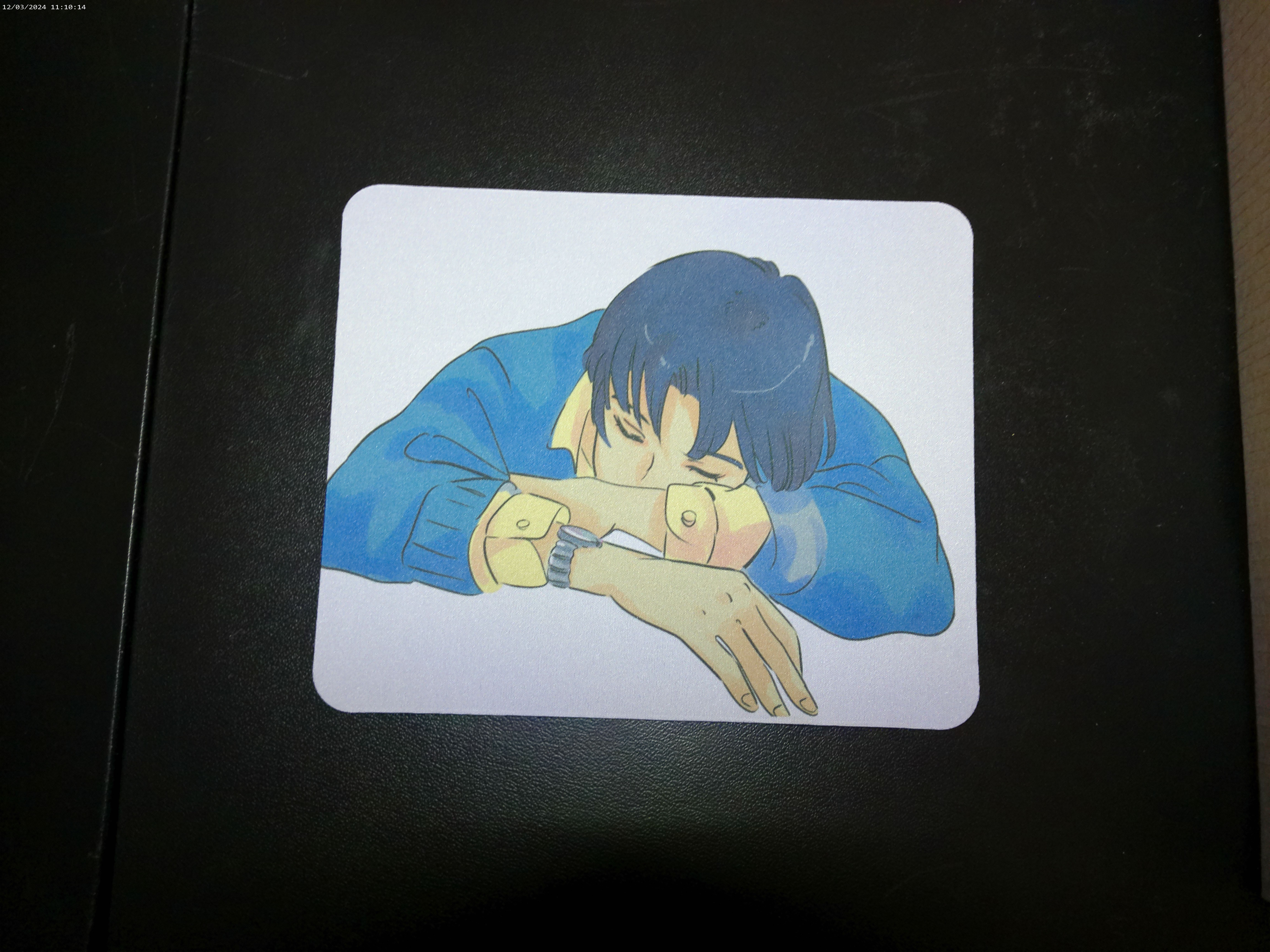 Mousepad with sleeping boy design