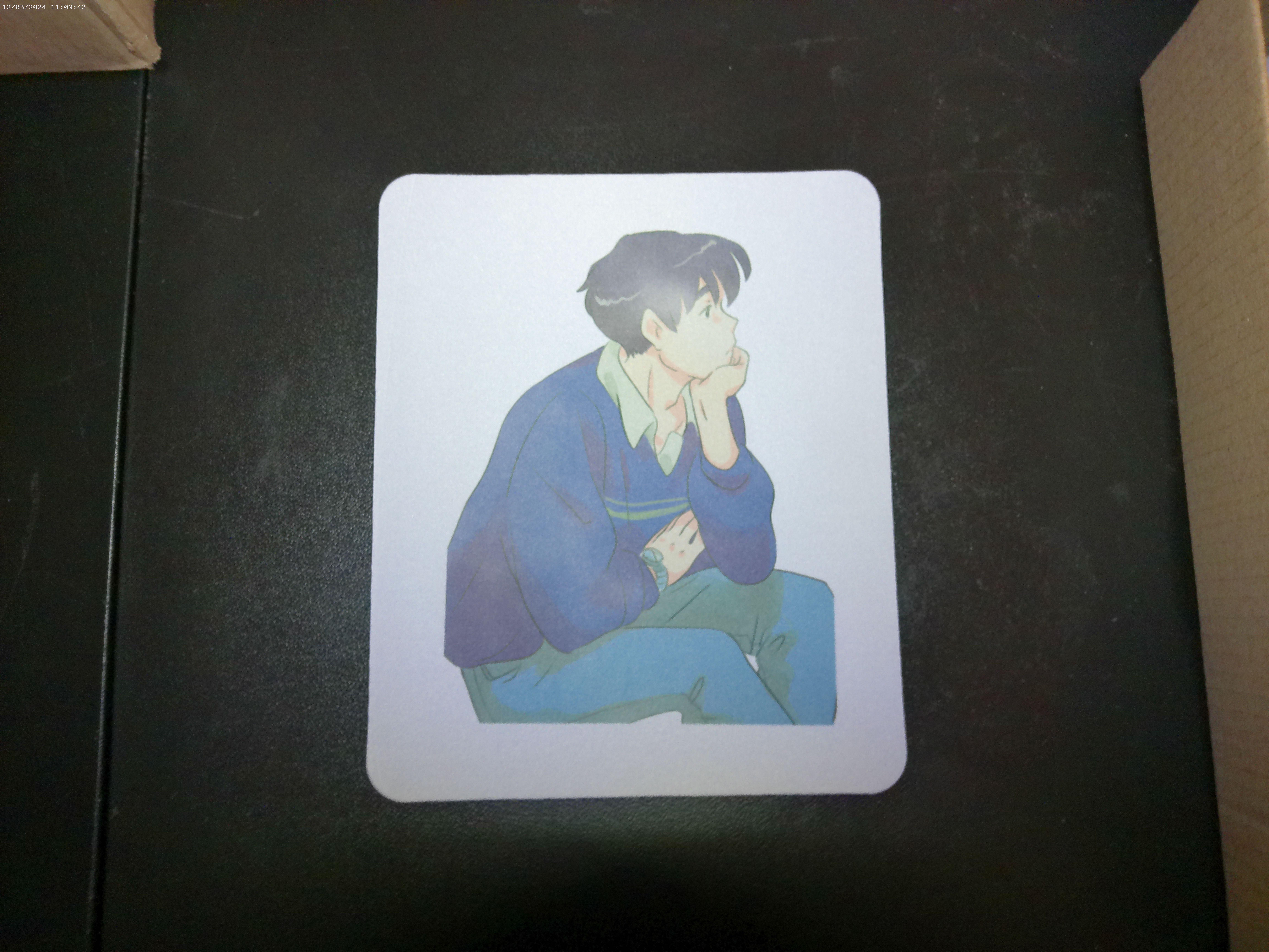 Mousepad with sitting boy in blue