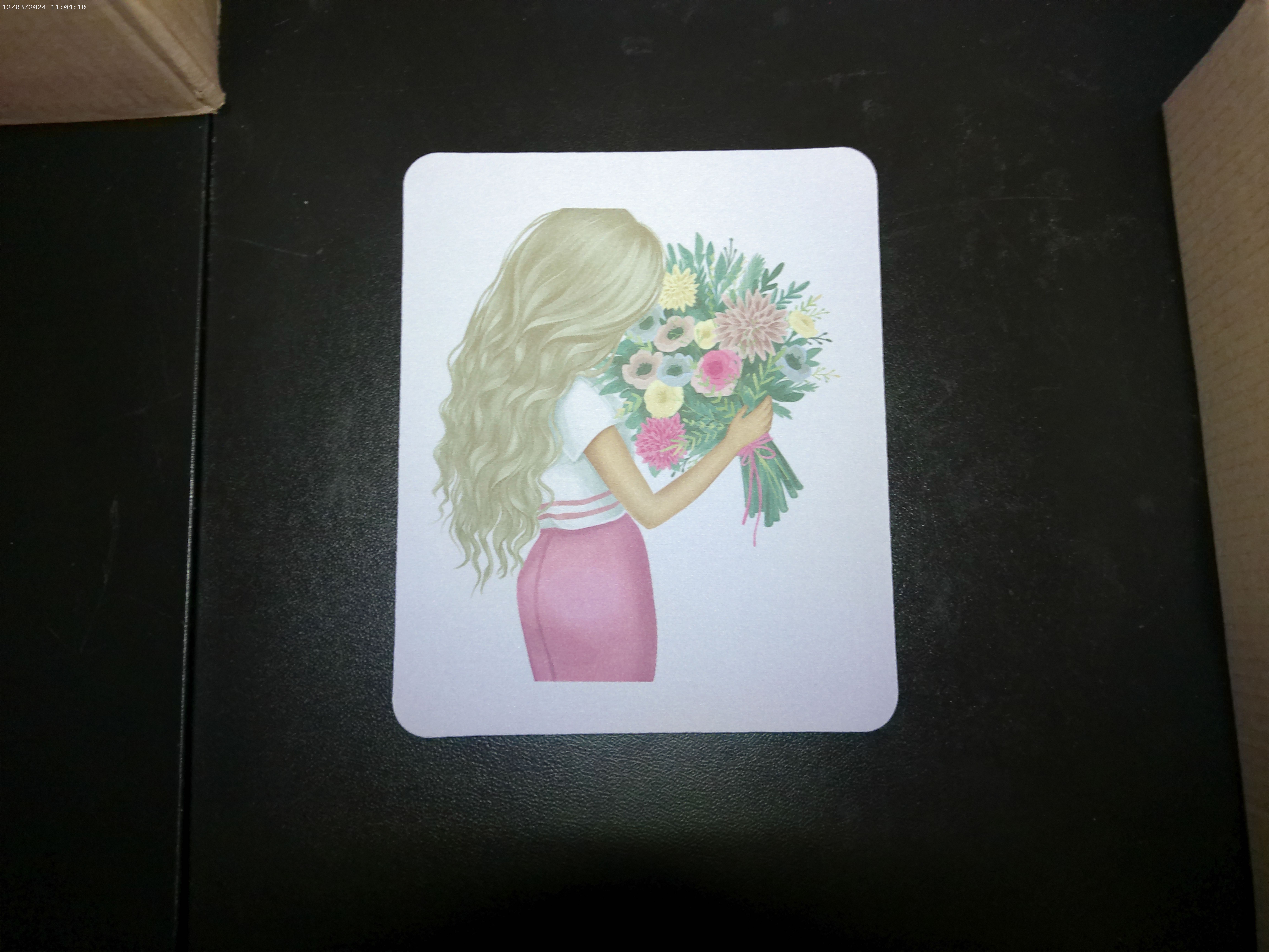 Mousepad with beautiful girl in pink smelling flowers