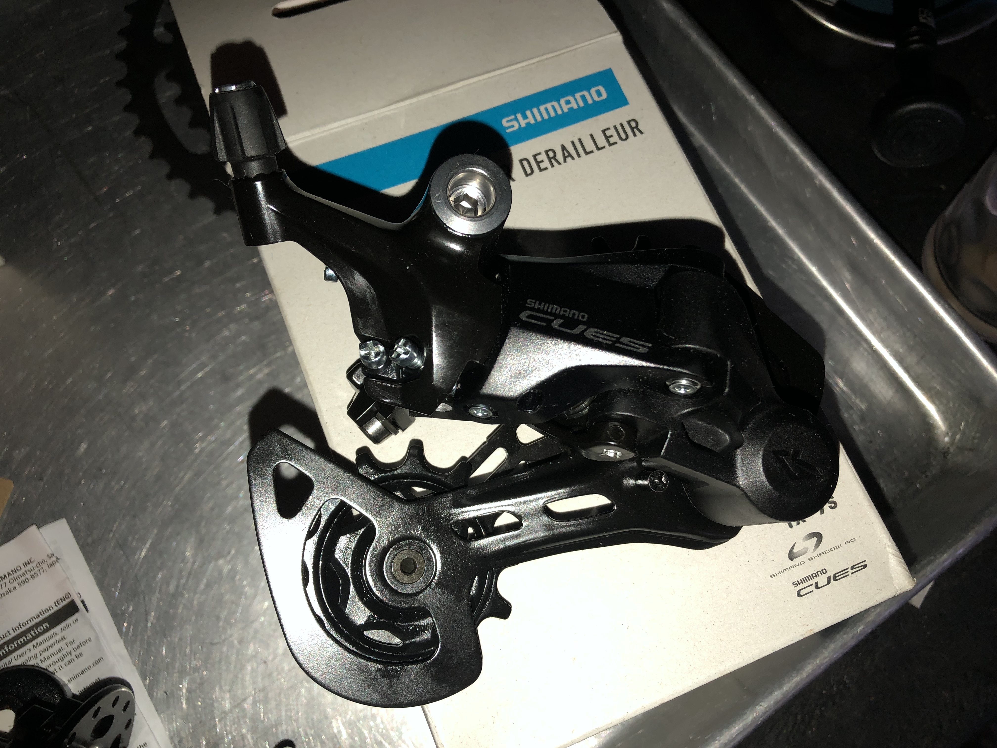 transmisión Shimano Cues 1x9 (pata, shifter, piñon y cadena)