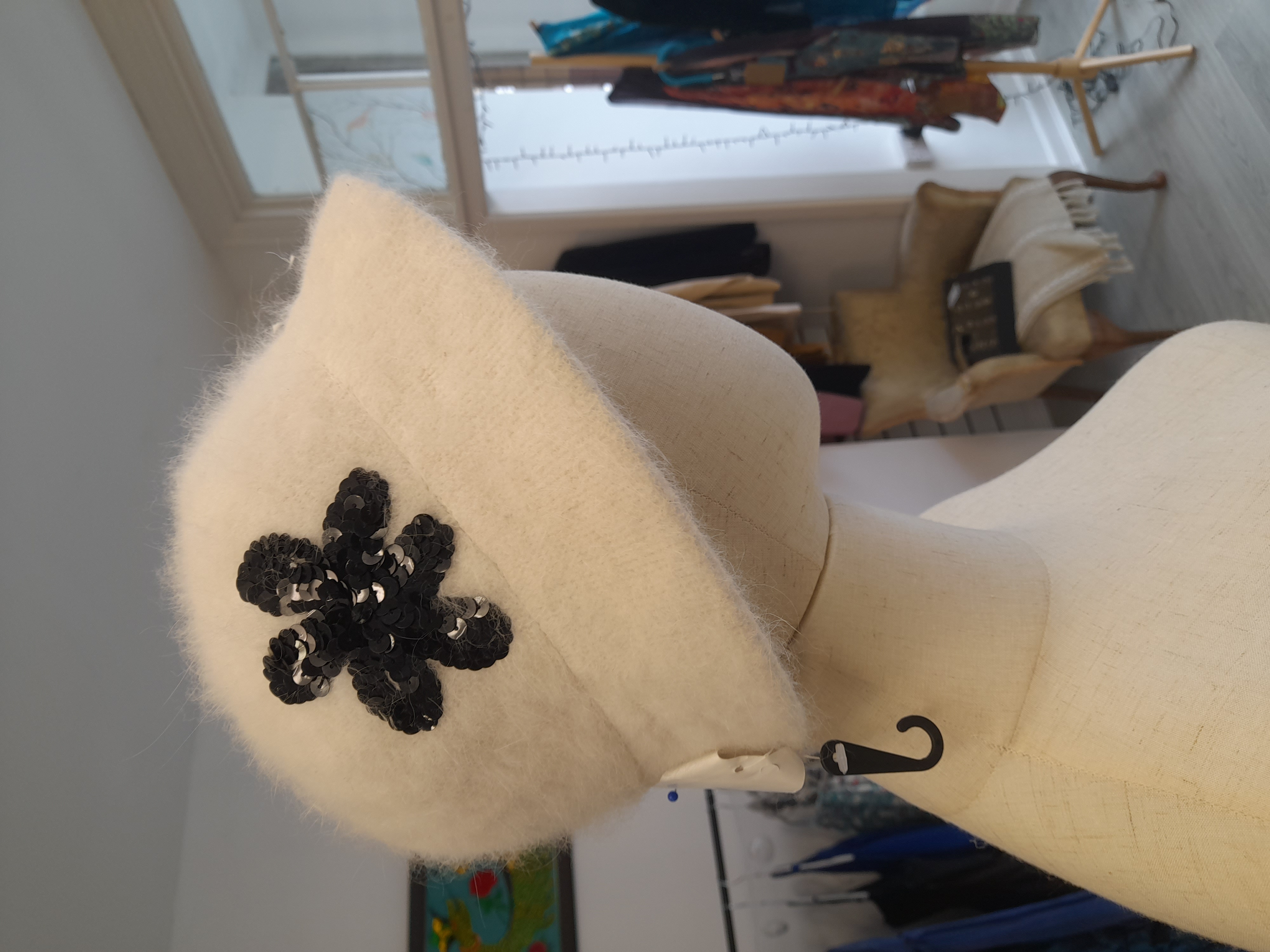 White Brand-new cute hat with black flower 