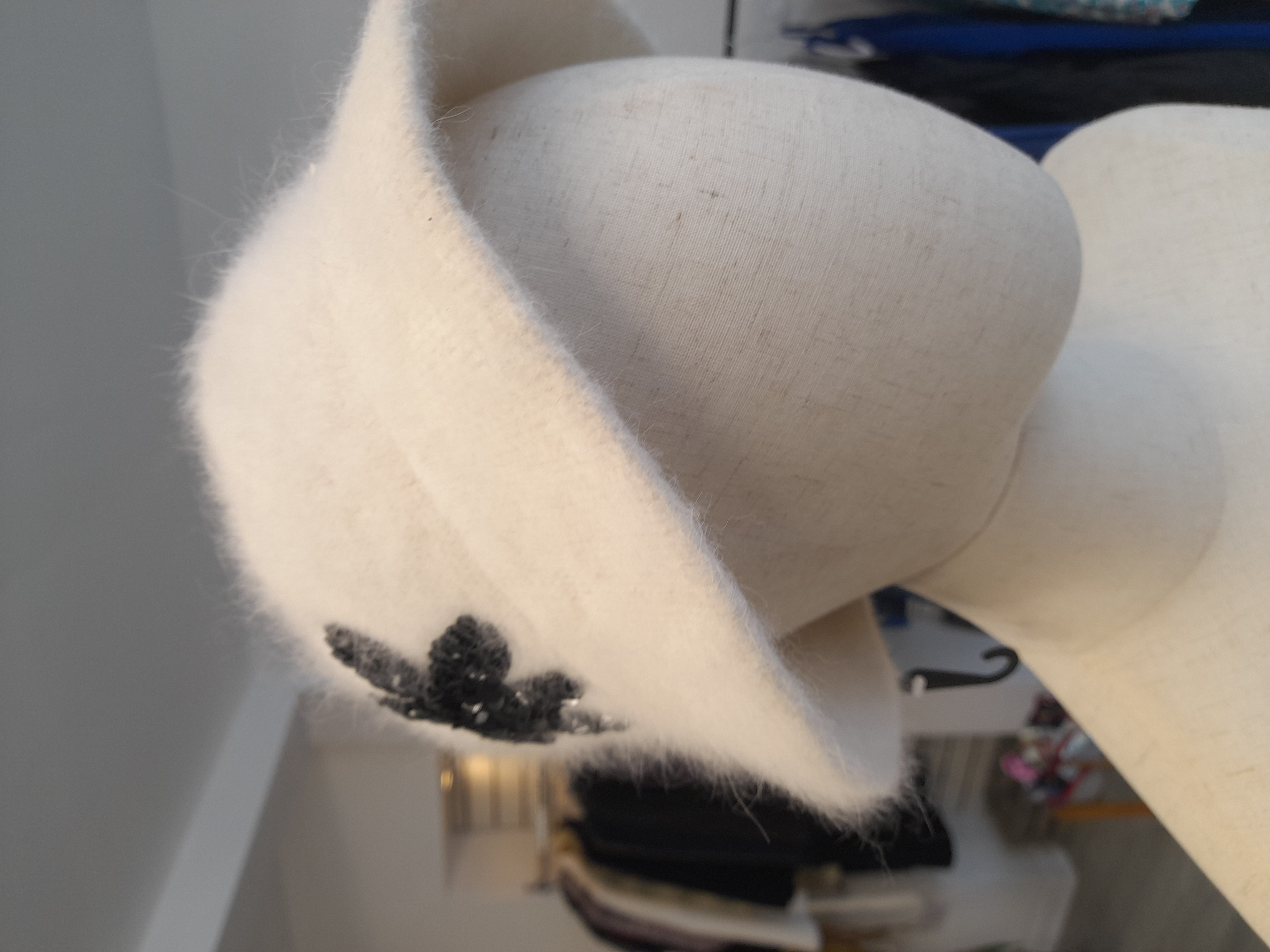 White Brand-new cute hat with black flower 