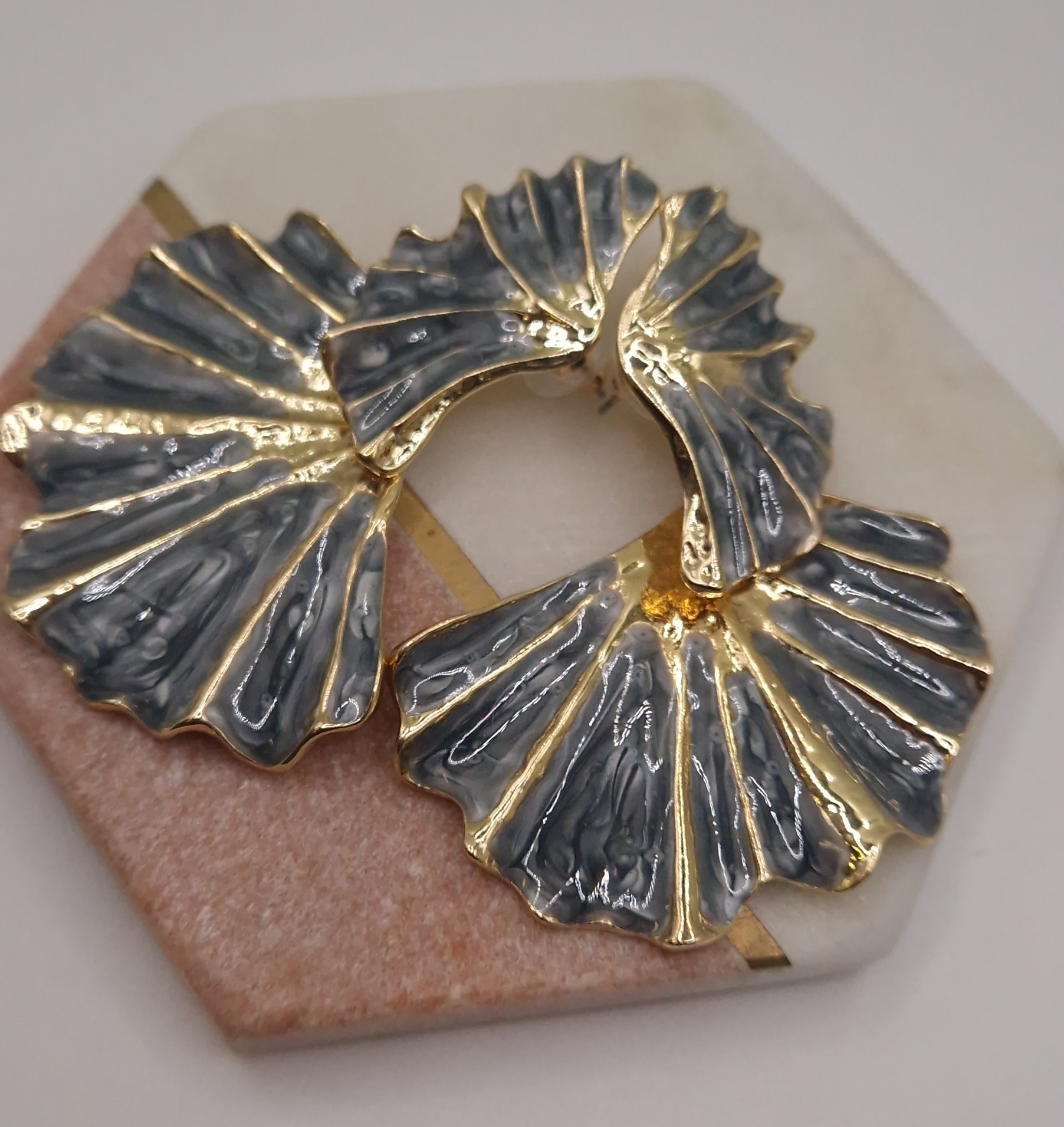 Fan-shaped statement earrings