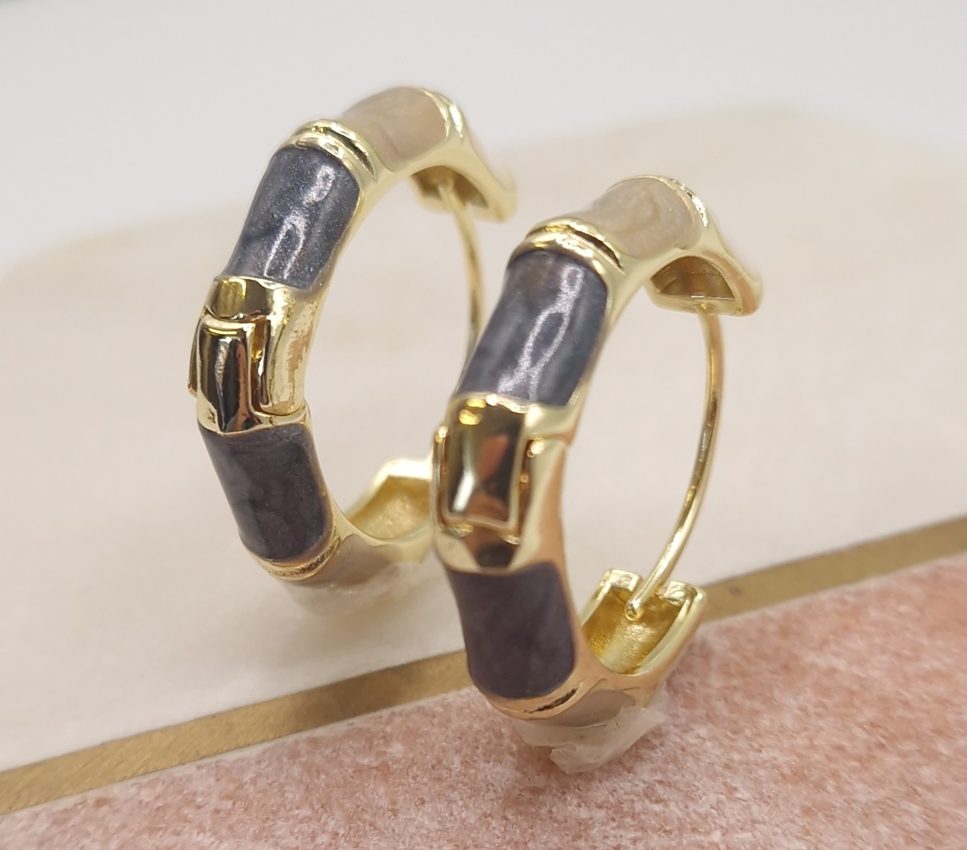 Gold and grey enamel bamboo-style hoop earrings
