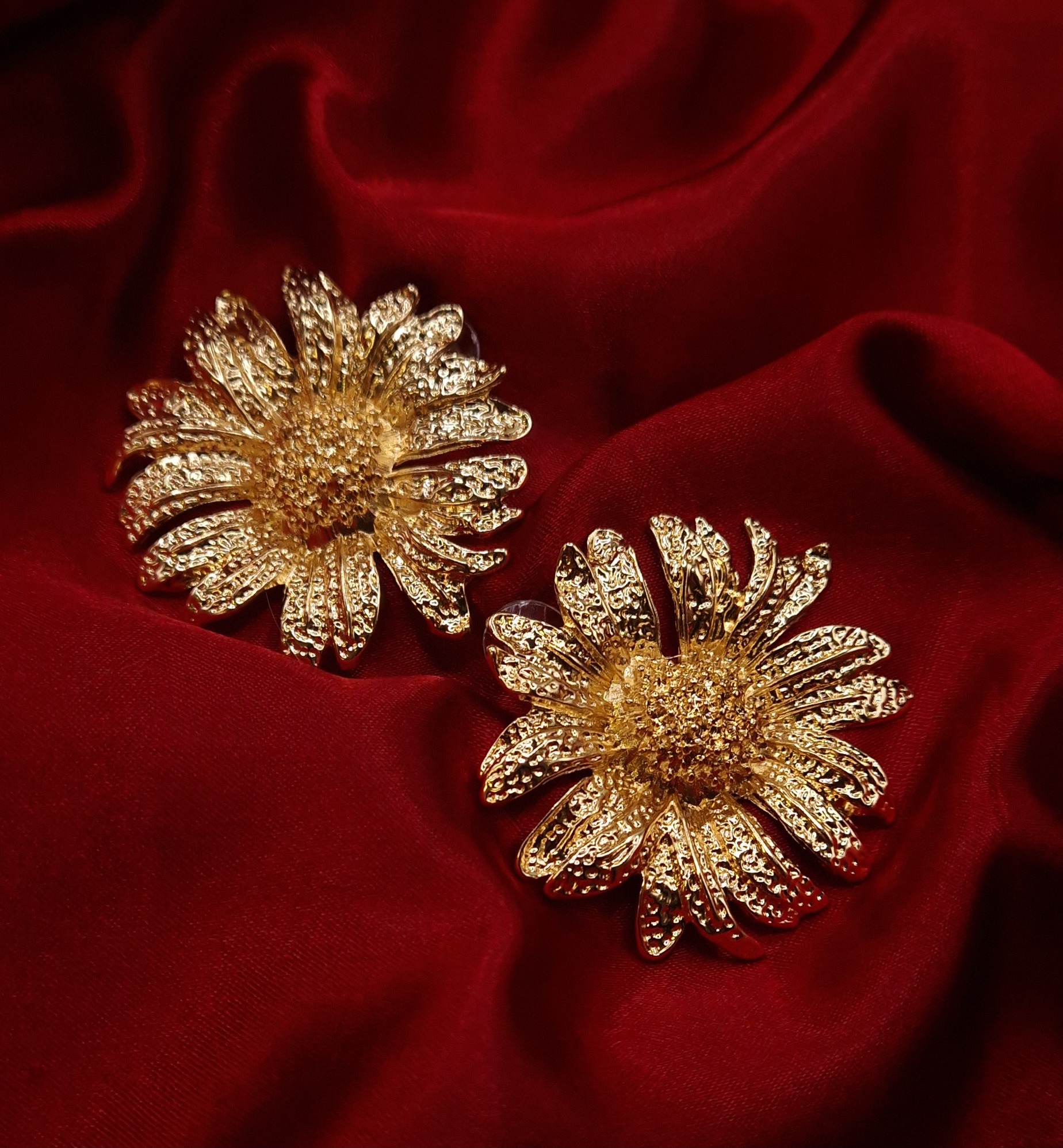 gold-plated statement flower stud earrings