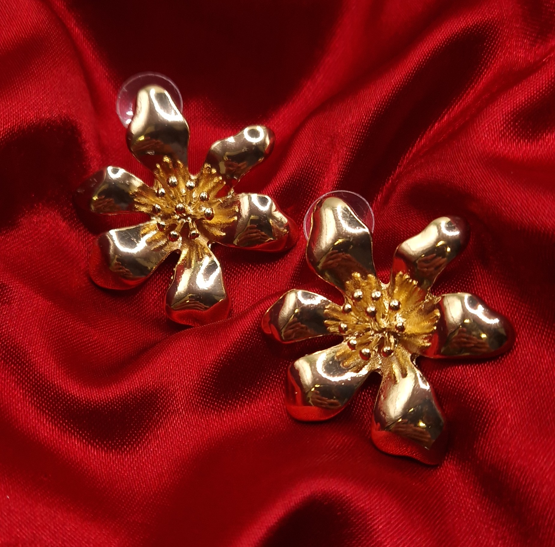 gold-plated statement flower stud earrings