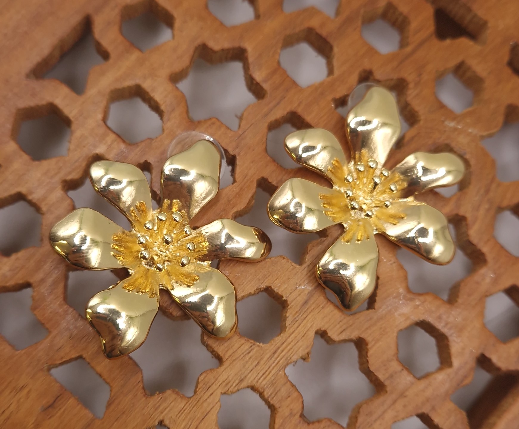 gold-plated statement flower stud earrings