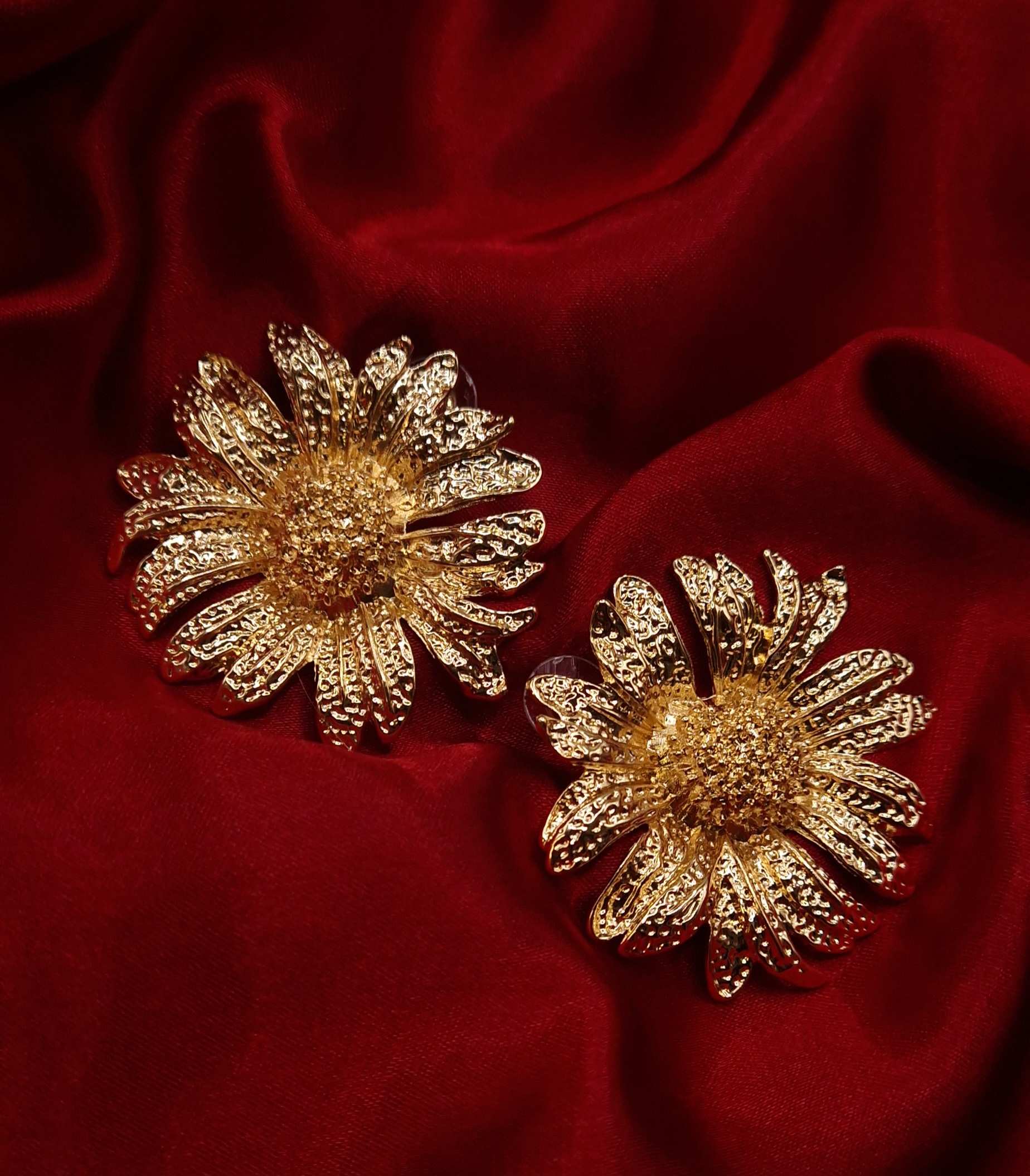 gold-plated statement flower stud earrings