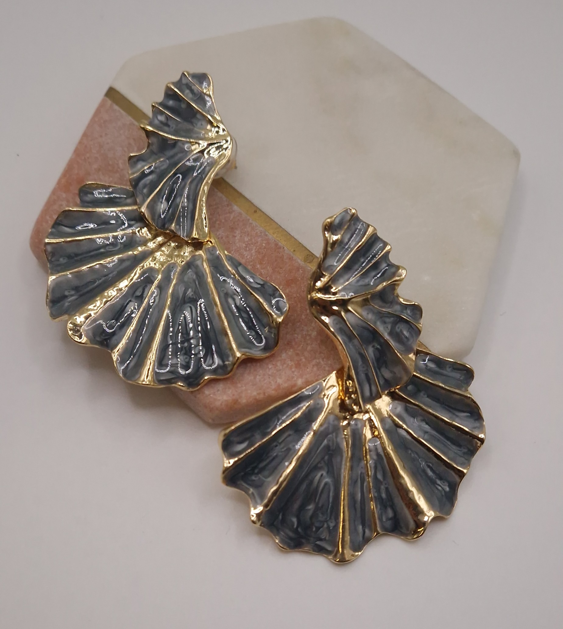 Fan-shaped statement earrings