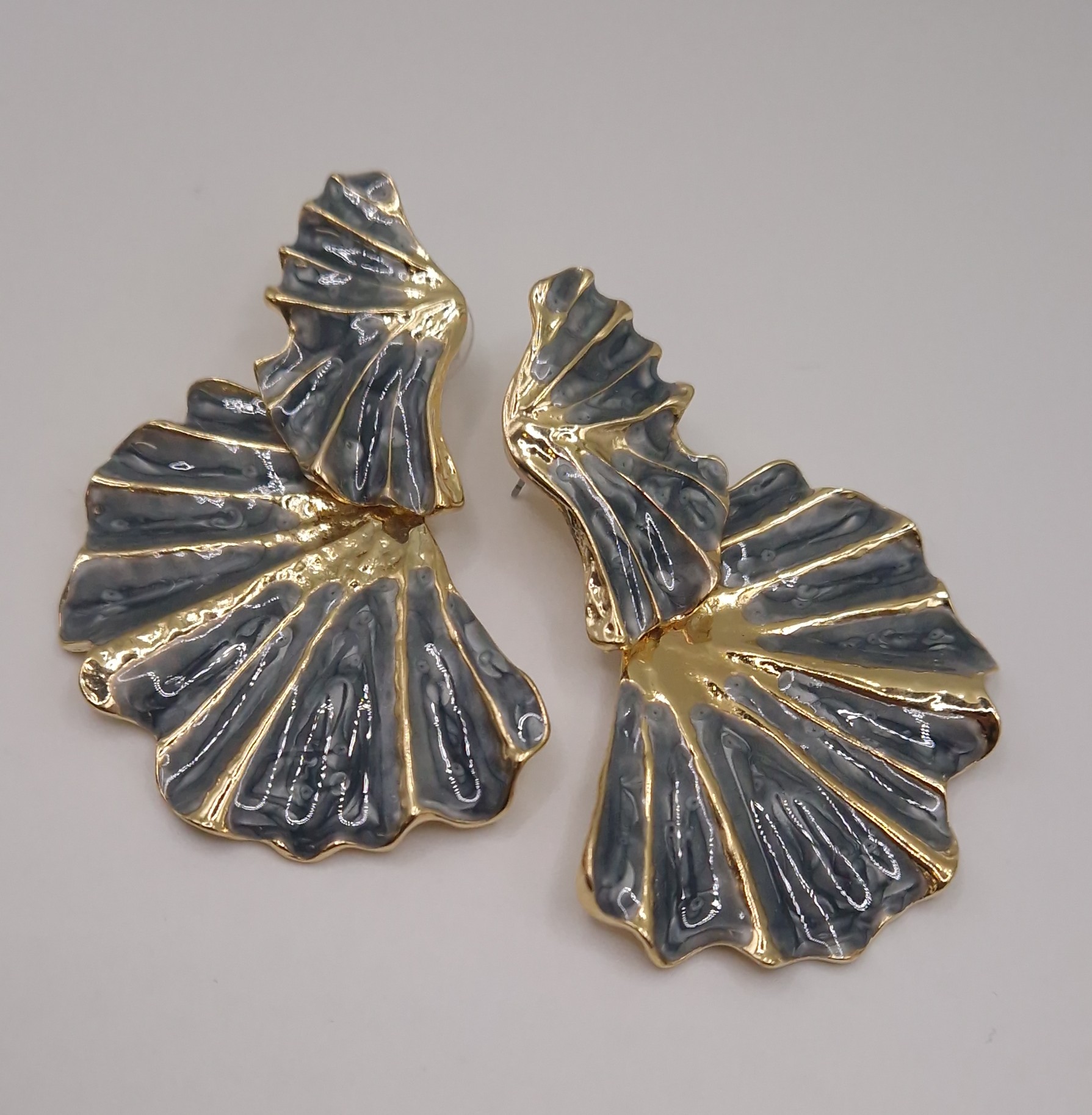 Fan-shaped statement earrings