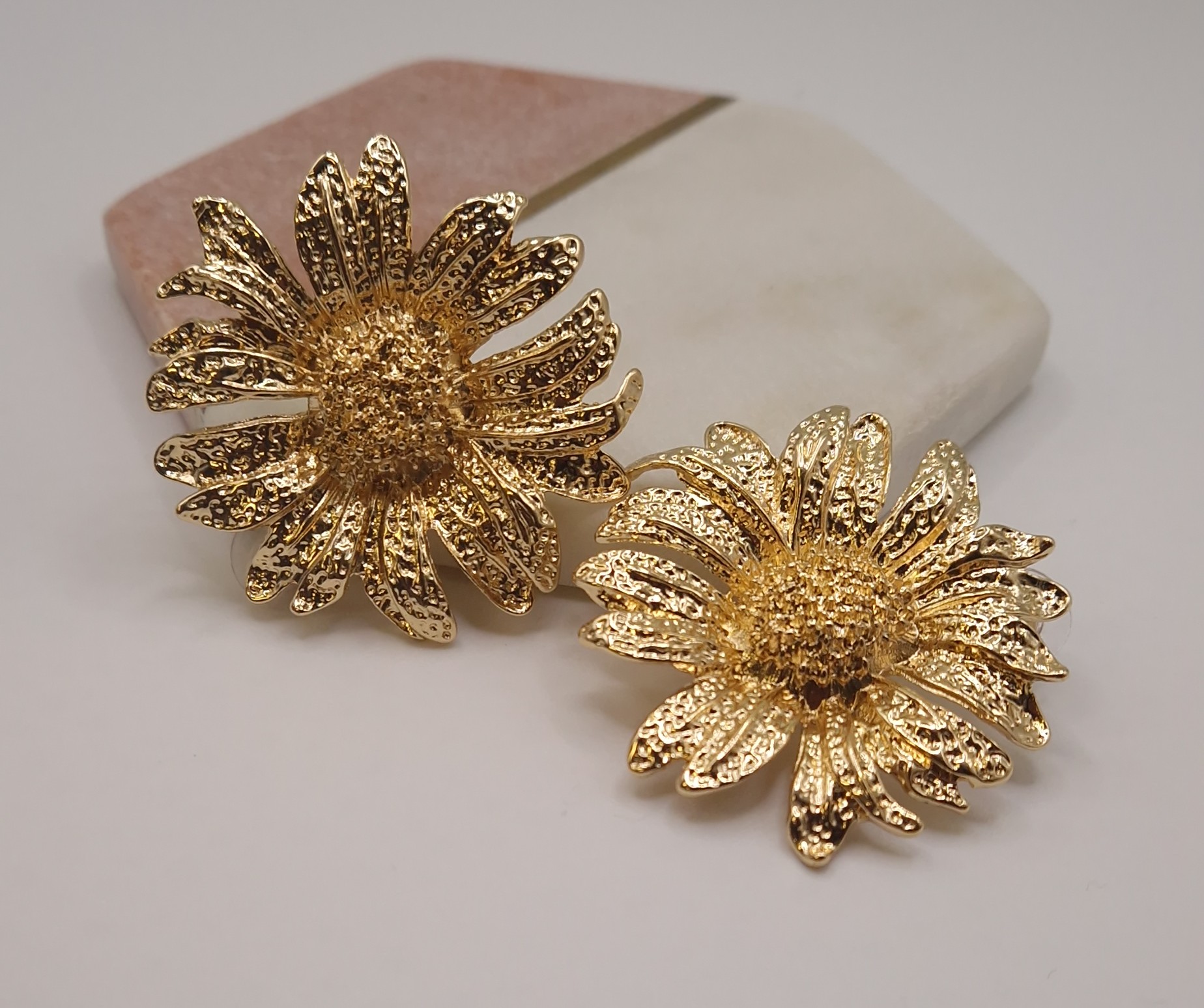 gold-plated statement flower stud earrings