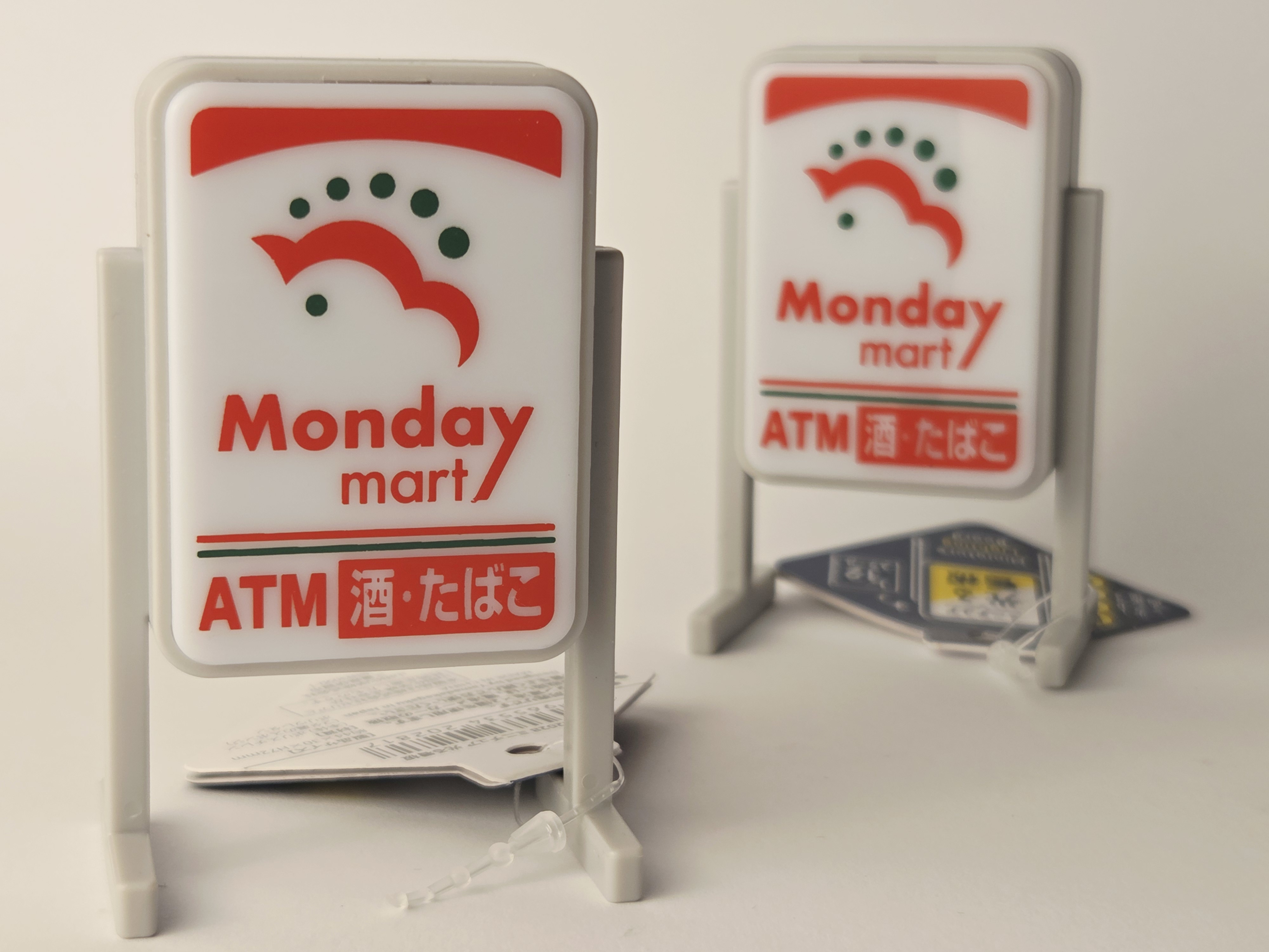 Miniatiūrinis šviečiantis Japonijos parduotuvės ženklas „Monday Mart“