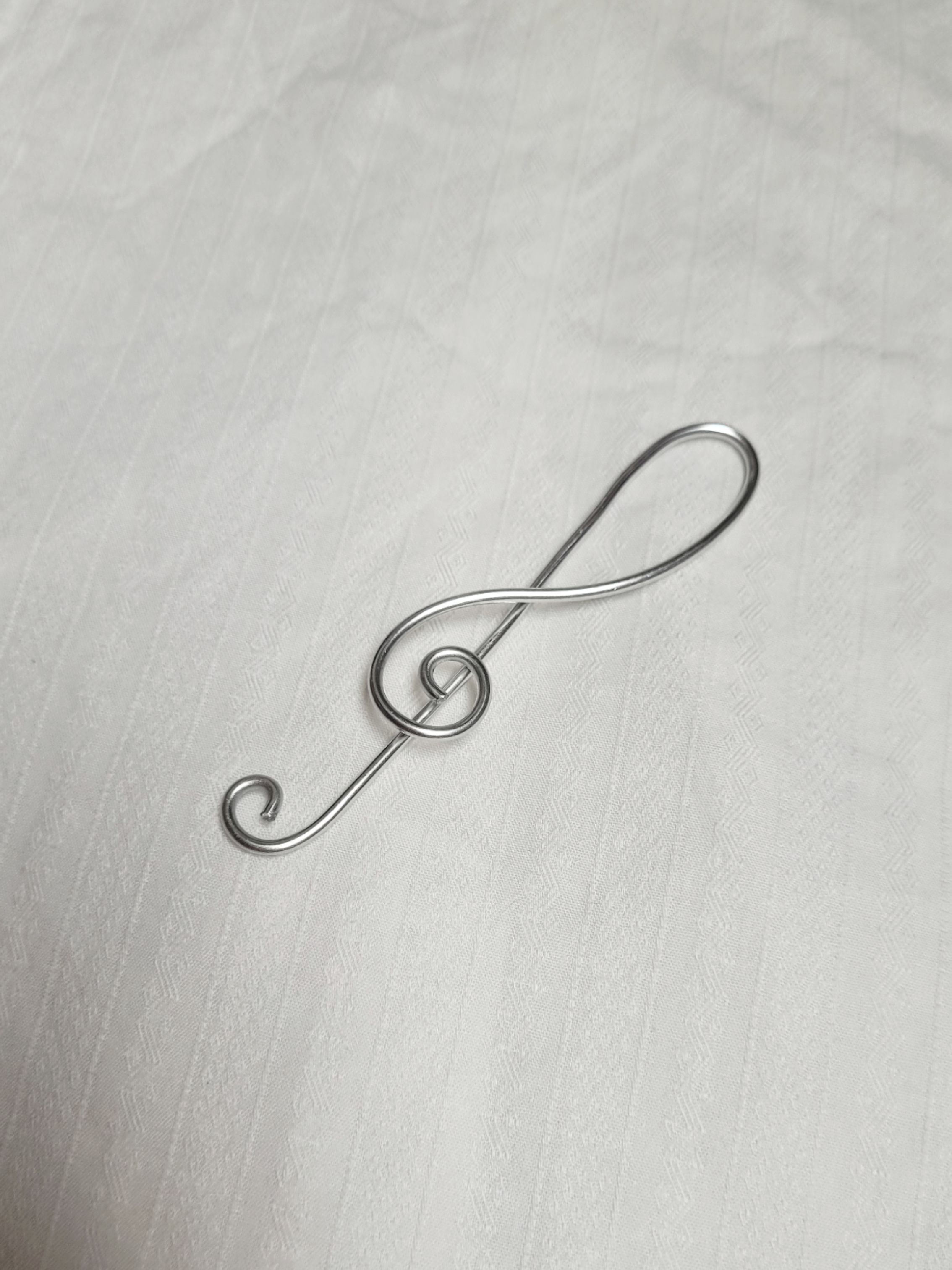 Ornœument clé de sol