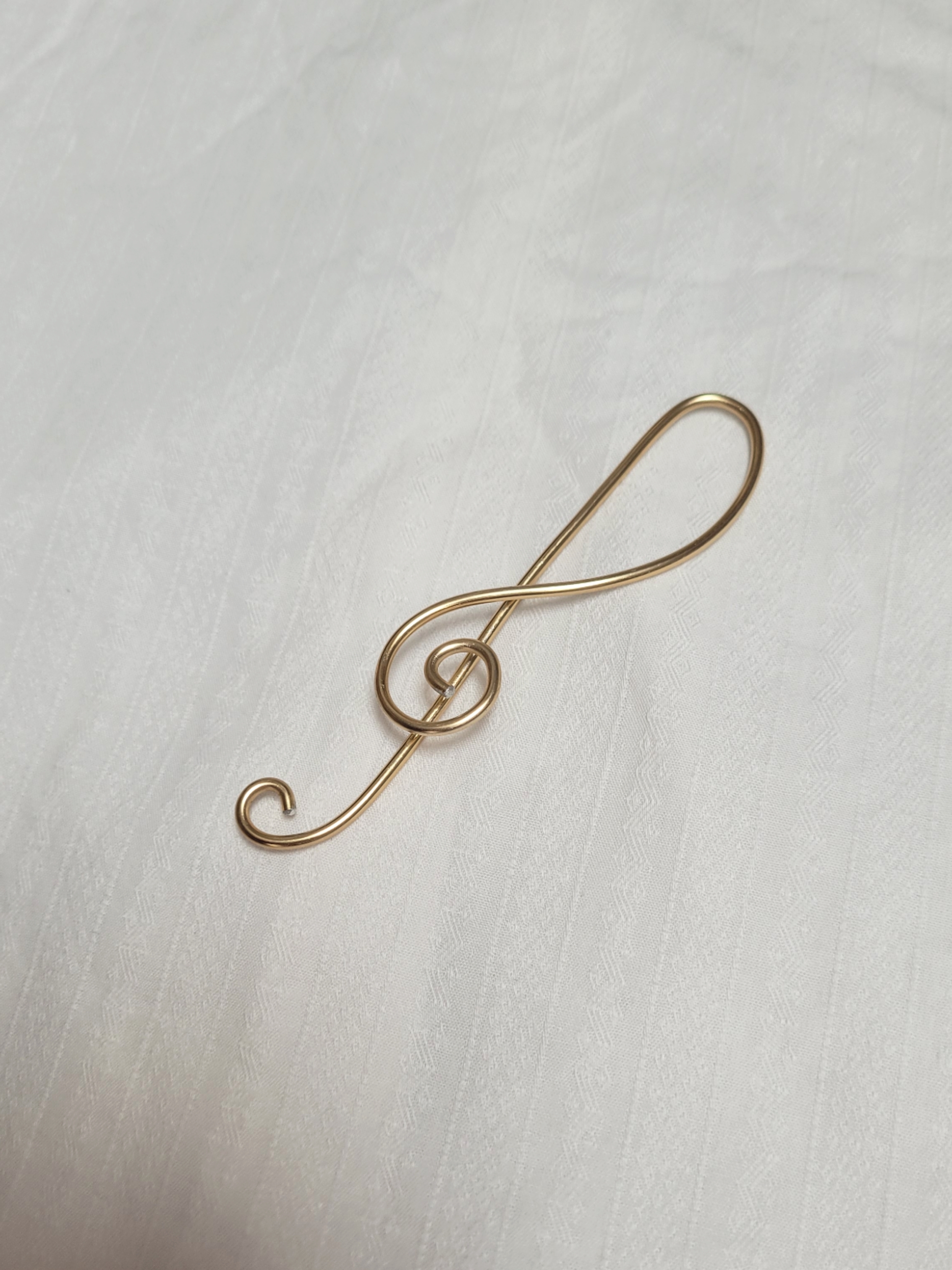 Ornœument clé de sol