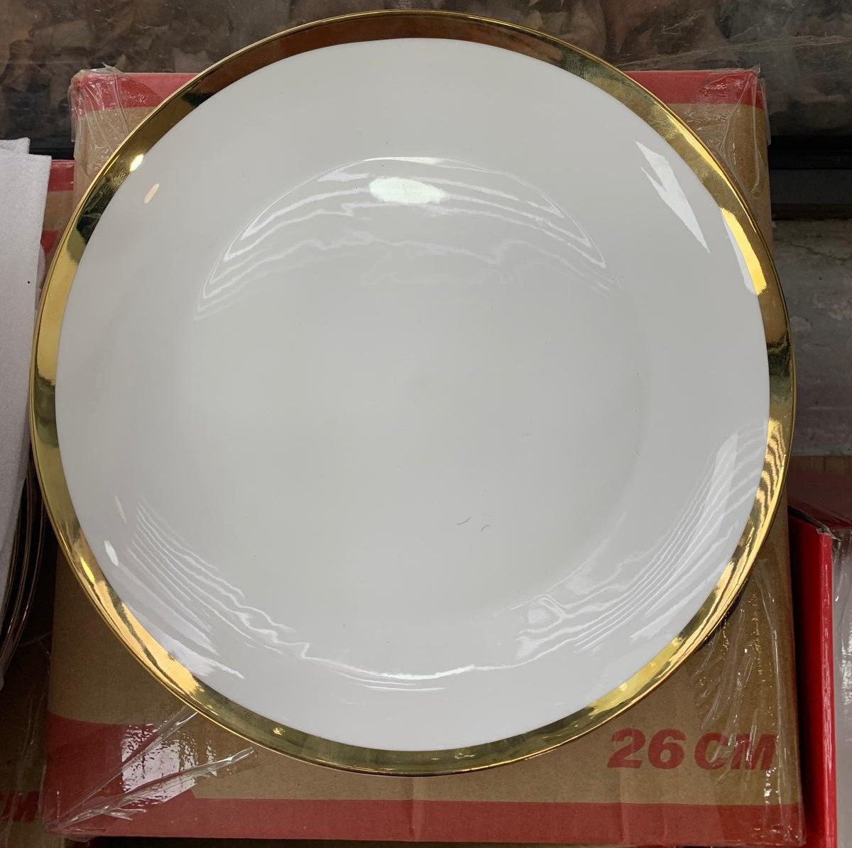 Assiette ronde bord doré de 26 à 46cm SWISS LINE