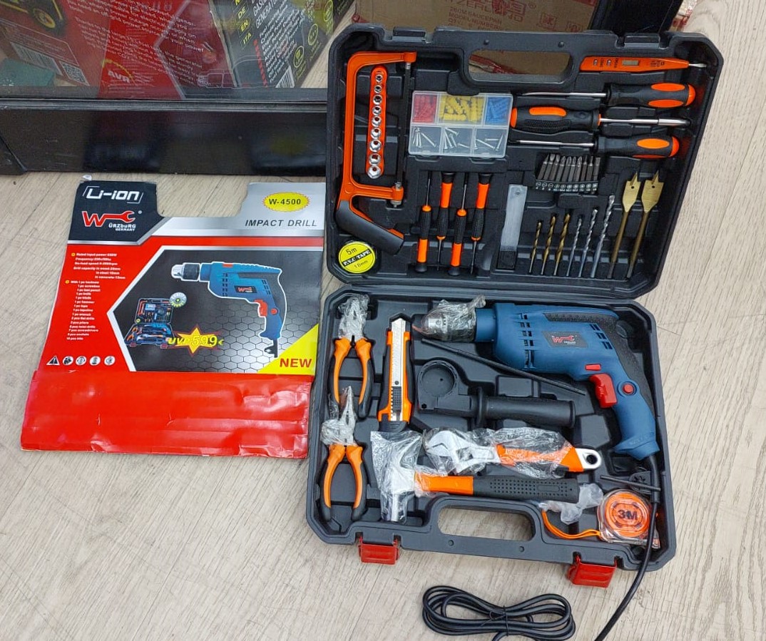 Perceuse à percutions 650W avec sa valise d'outils SL