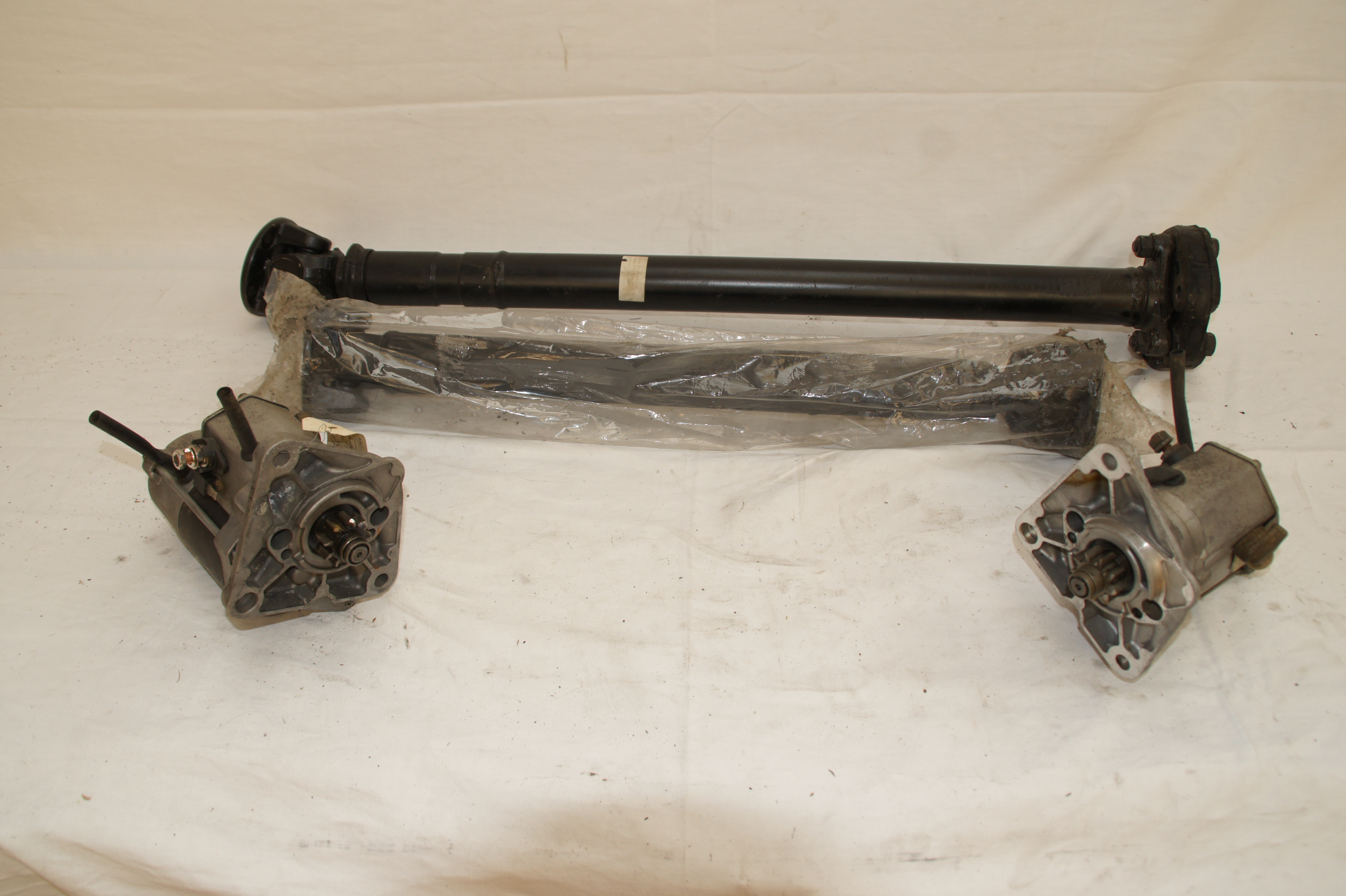 lot trés important de transmissions AV et AR tout types de LR + démarreur V8 et TD5 / FREE