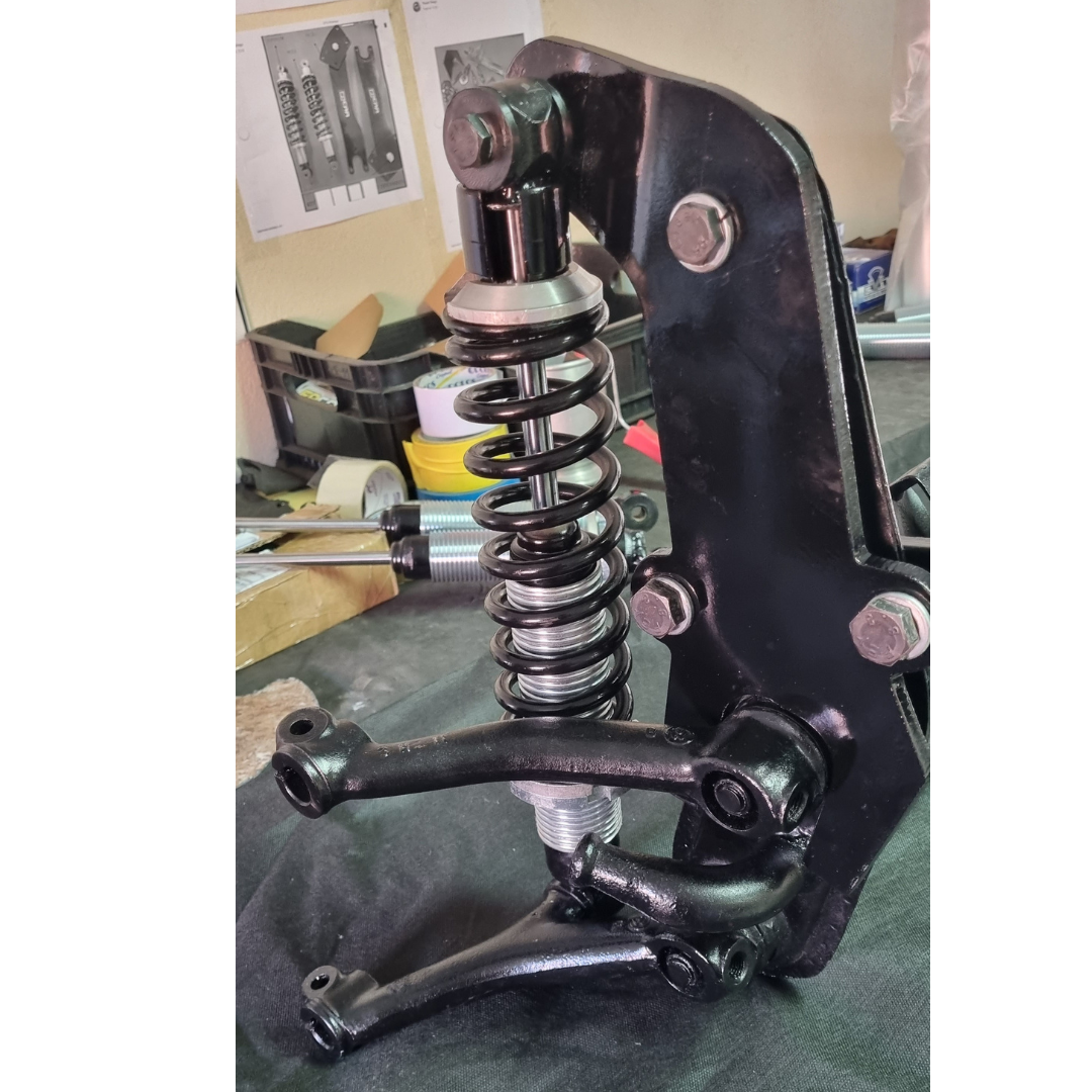 EIXO DIANTEIRO MODELO EMBUCHAMENTO COM SISTEMA COILOVER.