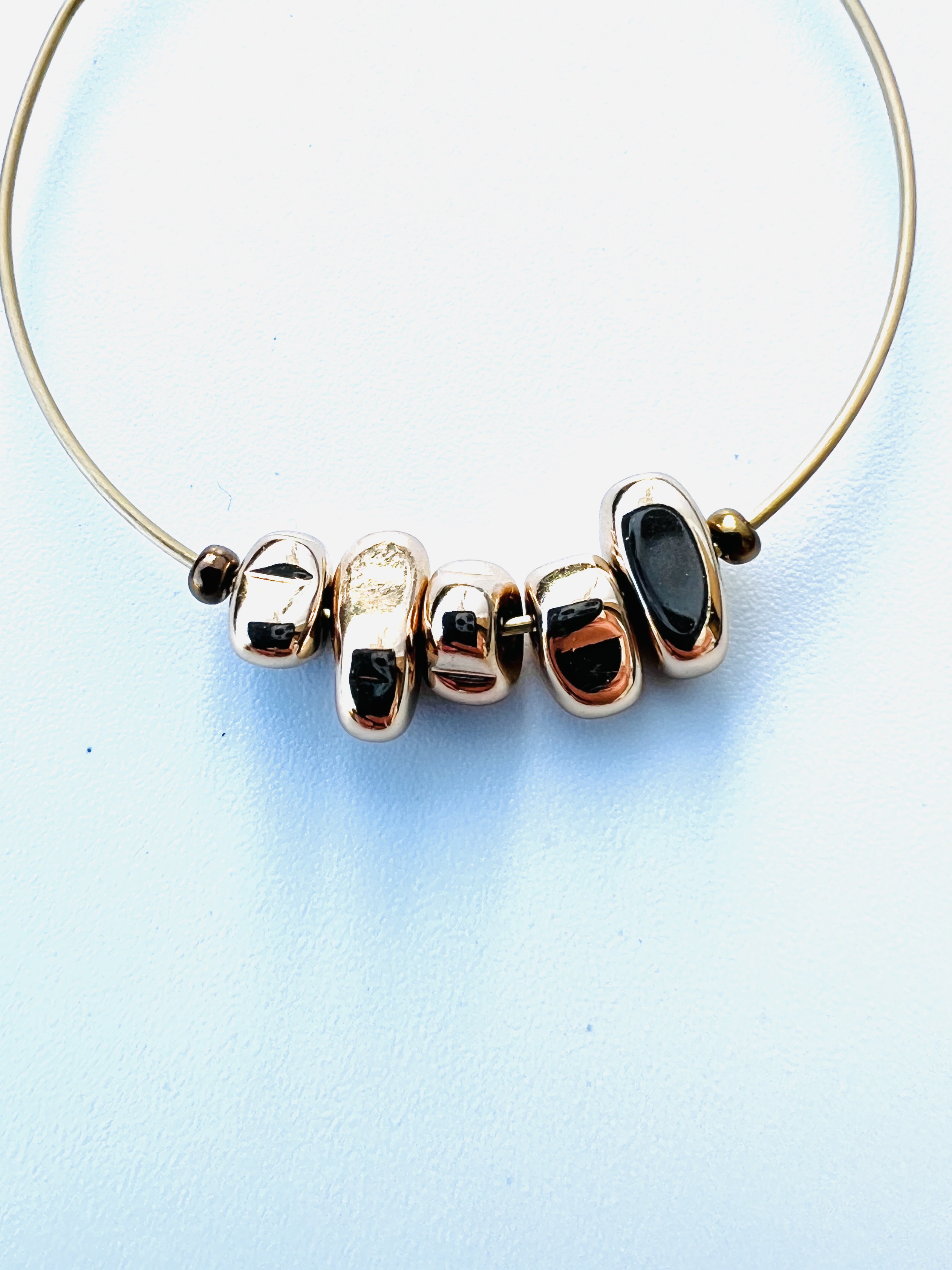 Créoles GOLD INUKSHUK, hématite plaqué or 14k