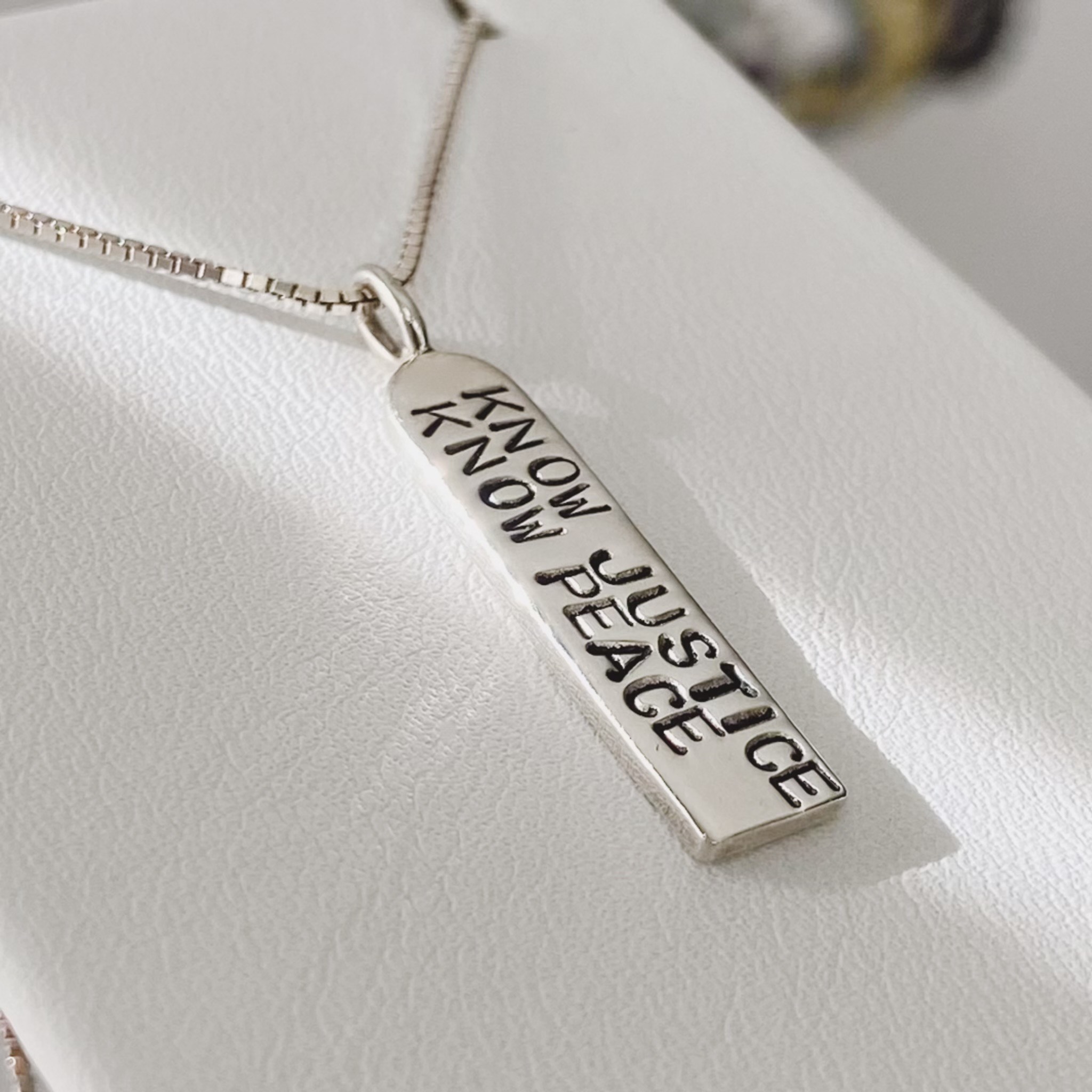 Know Justice Know Peace Pendant