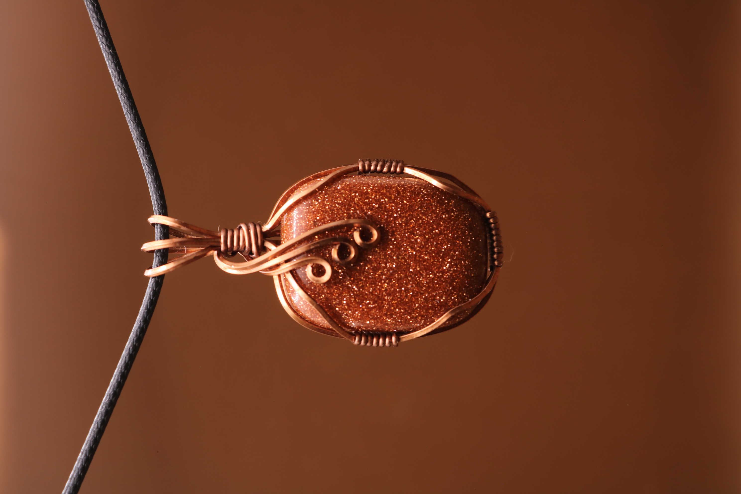 Copper Wire Wrapped Goldstone Crystal Necklace Pendant