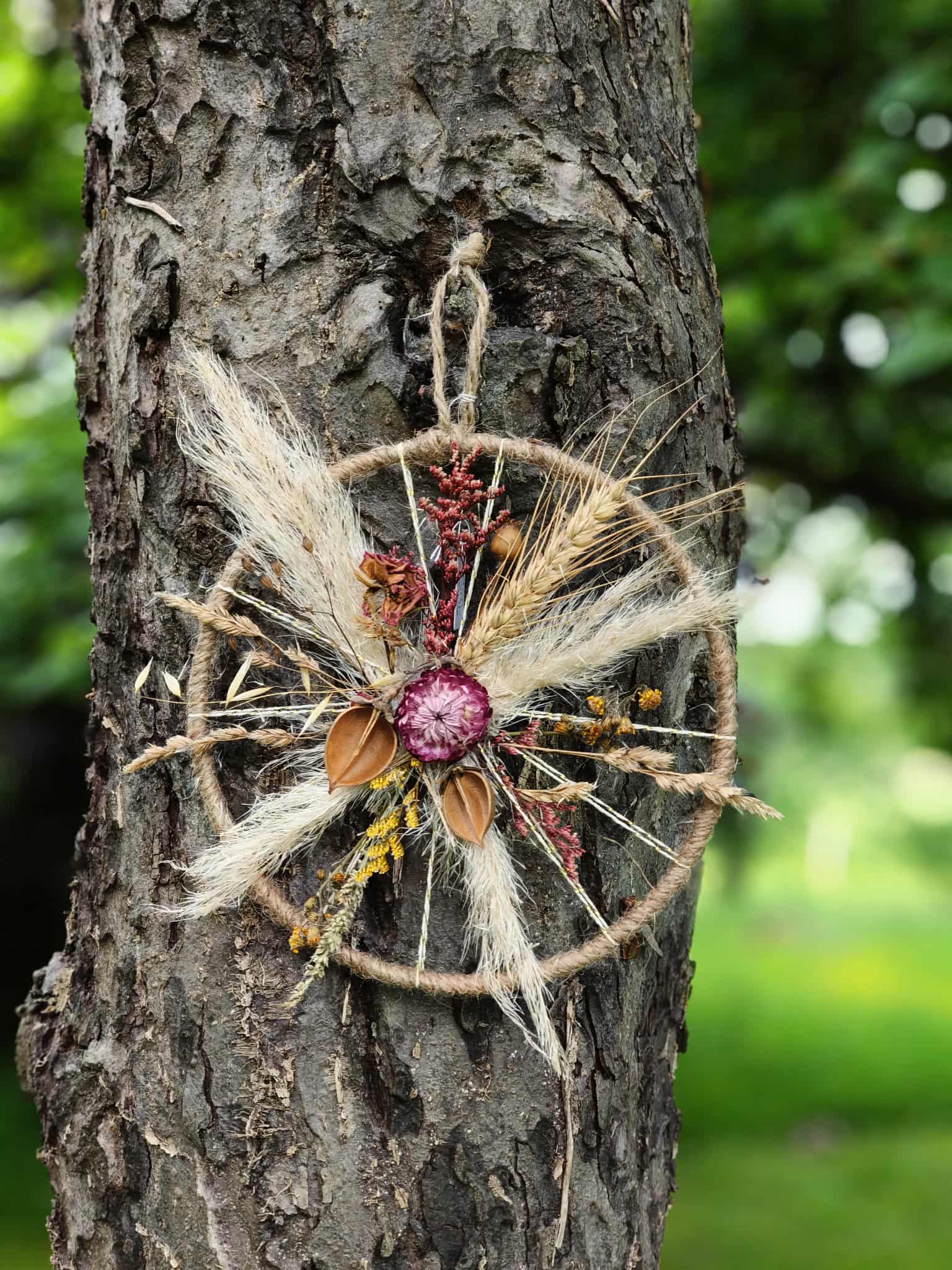 La roue étoilée - Couronne fleurs séchées