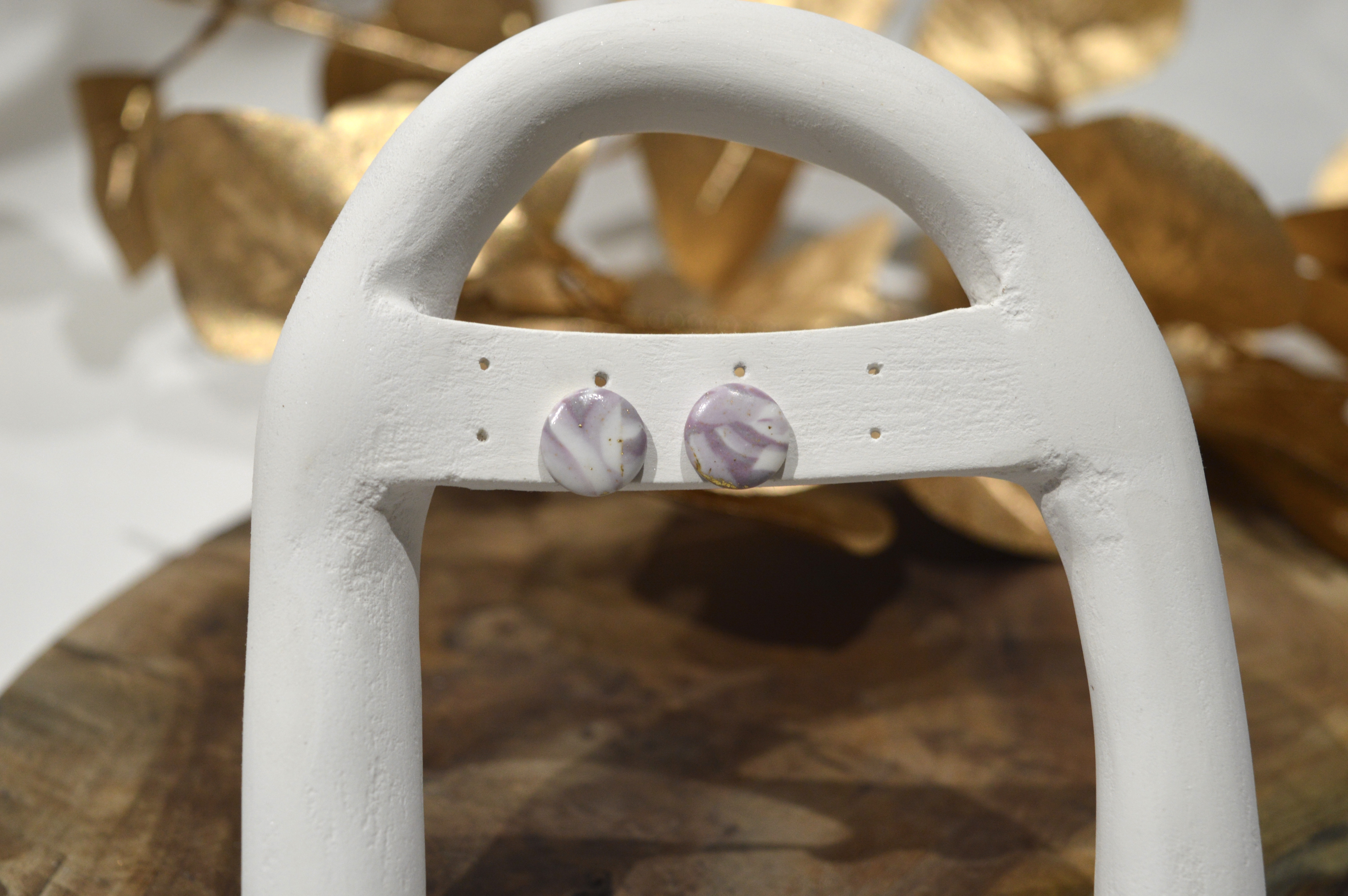 Puces d’oreilles marbrées violet
