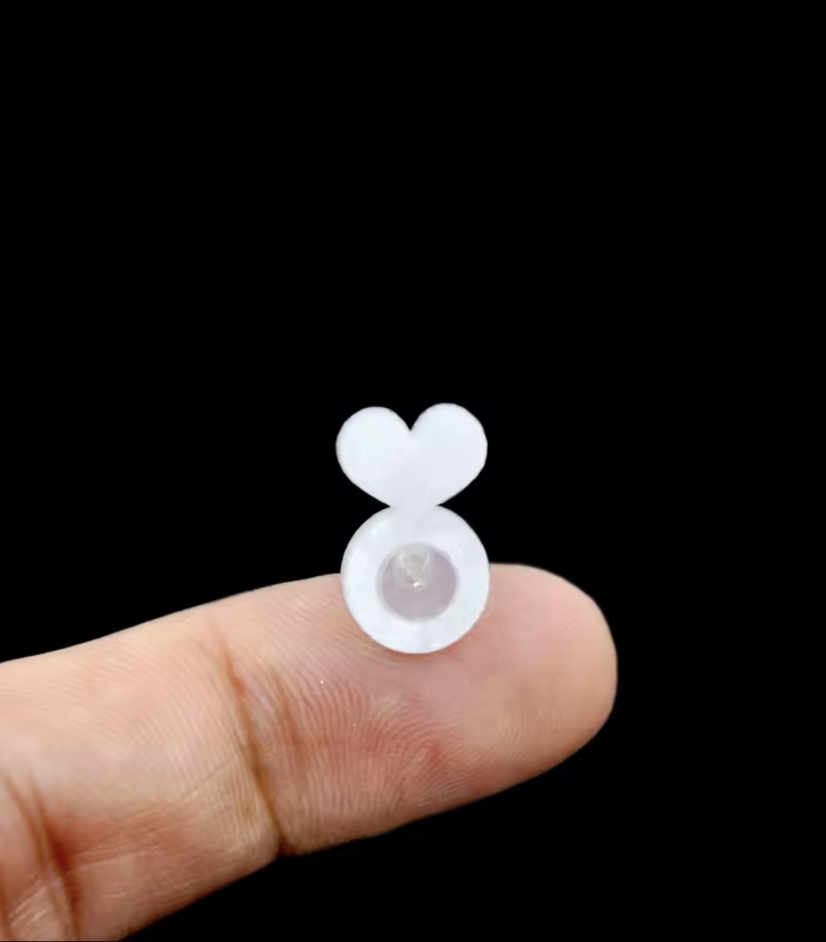 Réhausseur de boucles d’oreilles