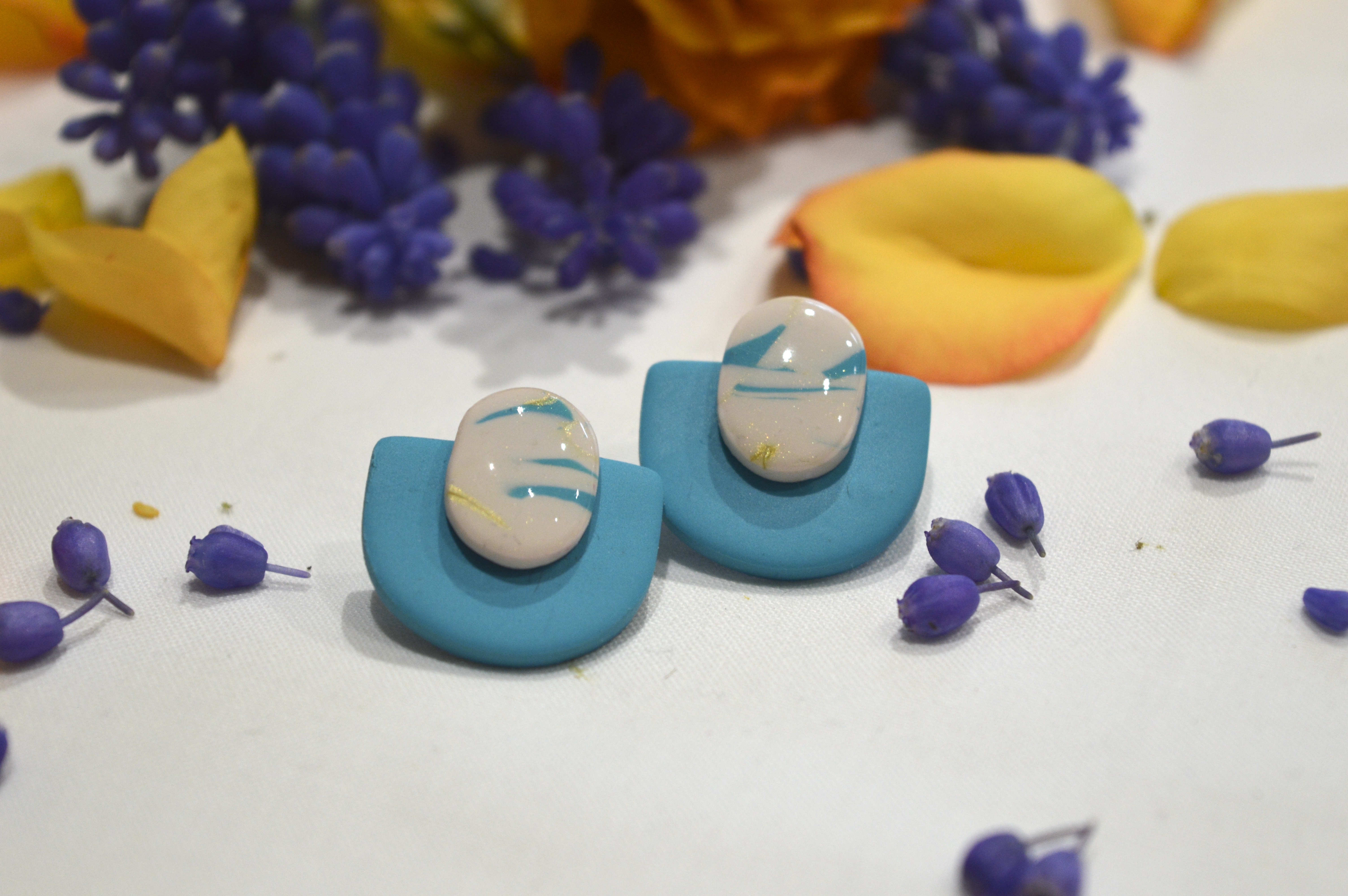 Puces d’oreilles bleue uni et marbré 