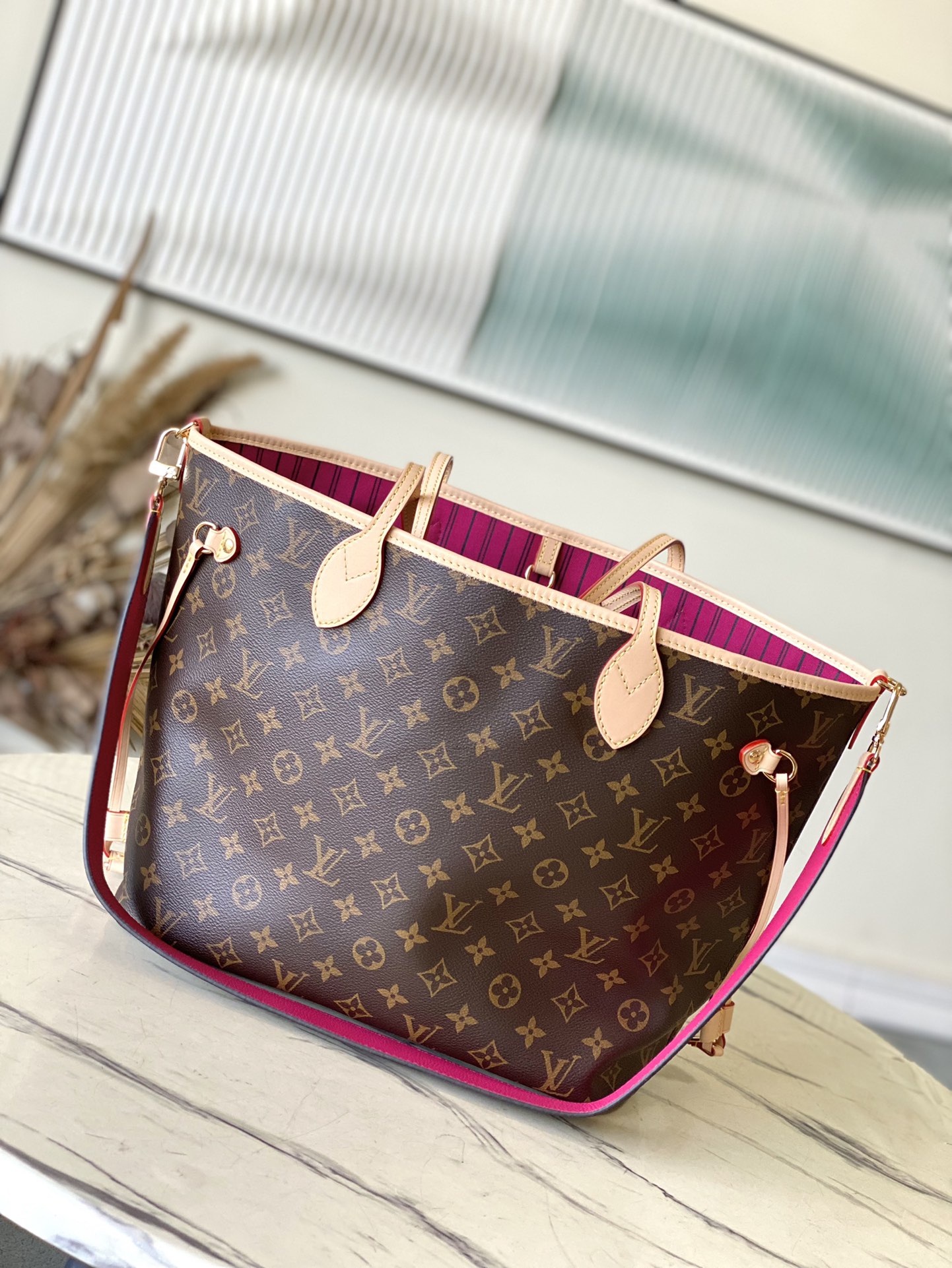 Louis Vuitton Neverfull Bandouliere Inside Out medium size does not have a handbag