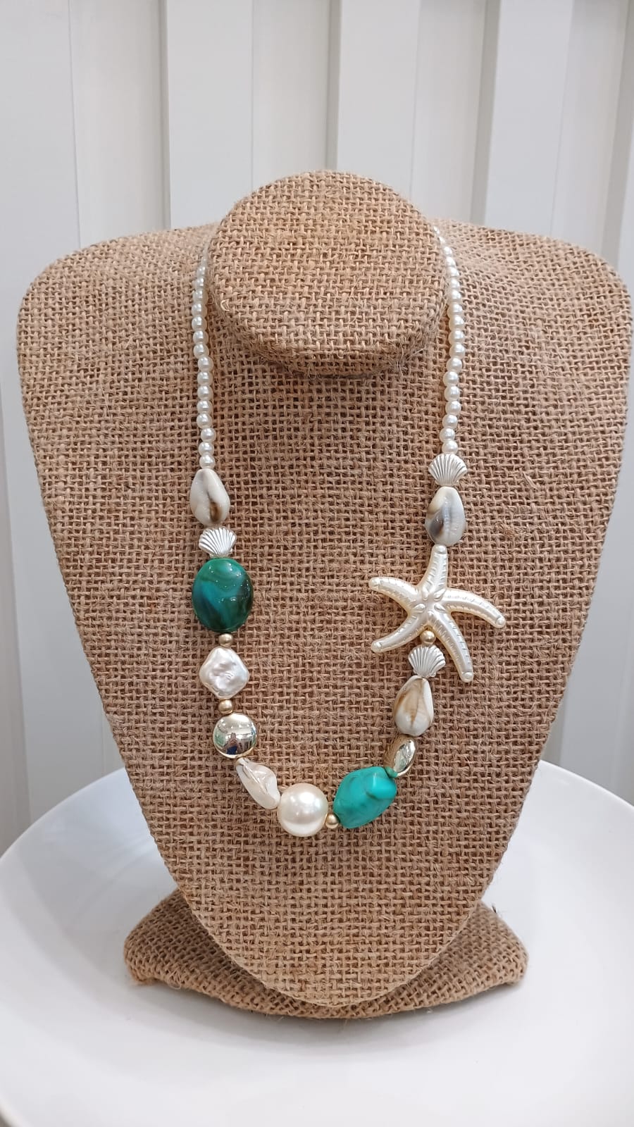Colar de conchas e estrela-do-mar