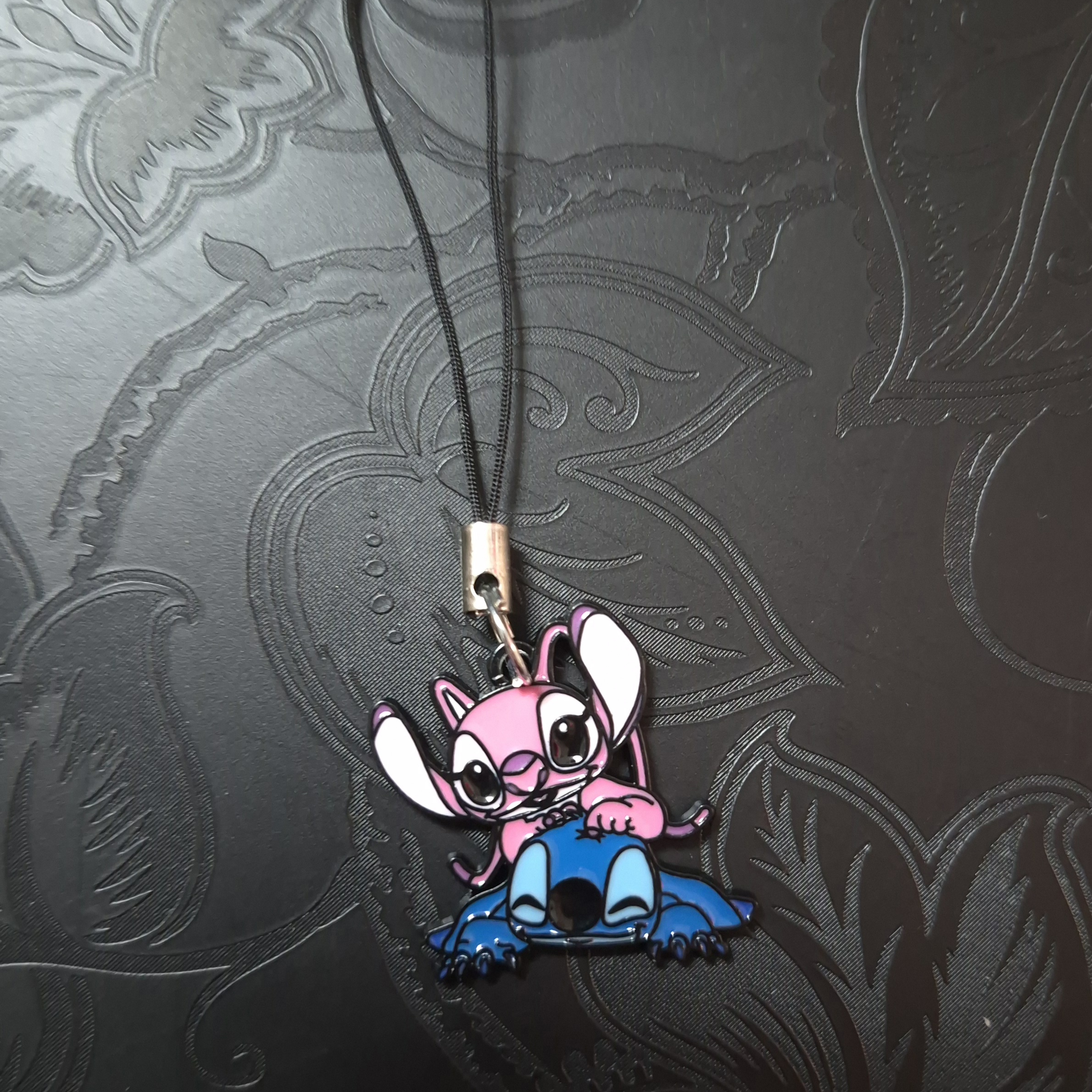 Bijou de téléphone 'STITCH&ANGEL'