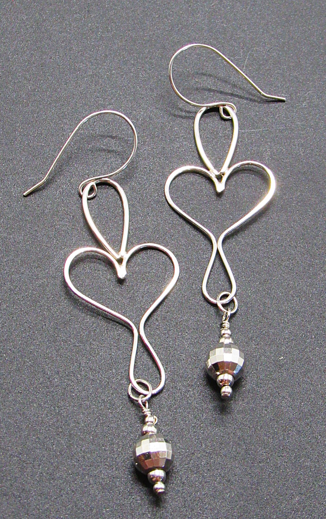 Elegant Heart-Shaped Earrings Made Of Sterling Silver
