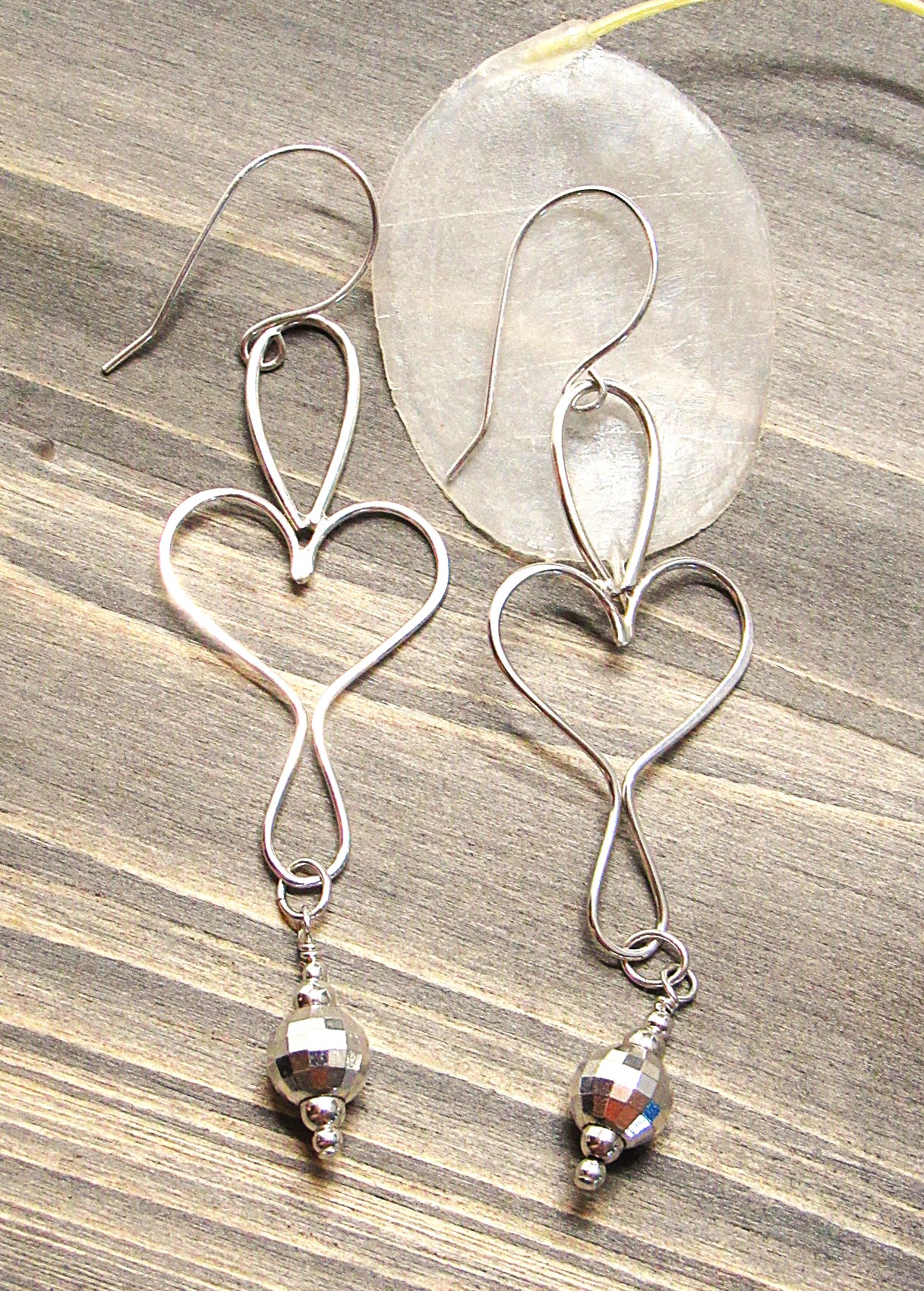 Elegant Heart-Shaped Earrings Made Of Sterling Silver