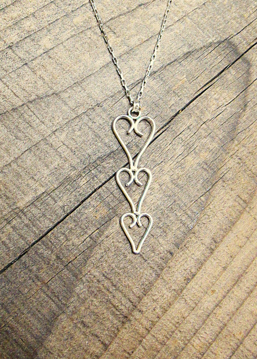 Triple Heart Pendant Necklace in Sterling Silver