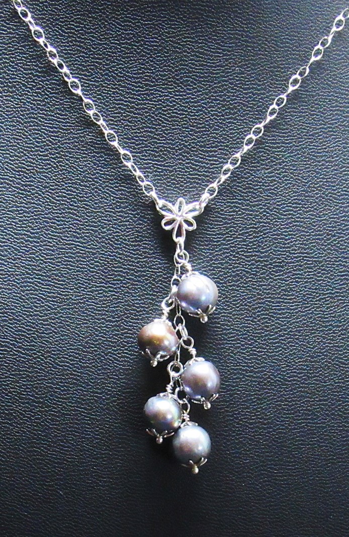 Elegant Pearl Cascade Necklace in Sterling Silver