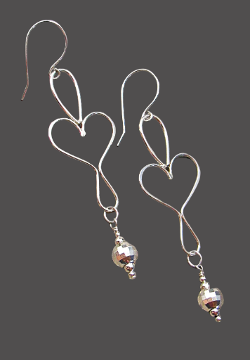 Elegant Heart-Shaped Earrings Made Of Sterling Silver