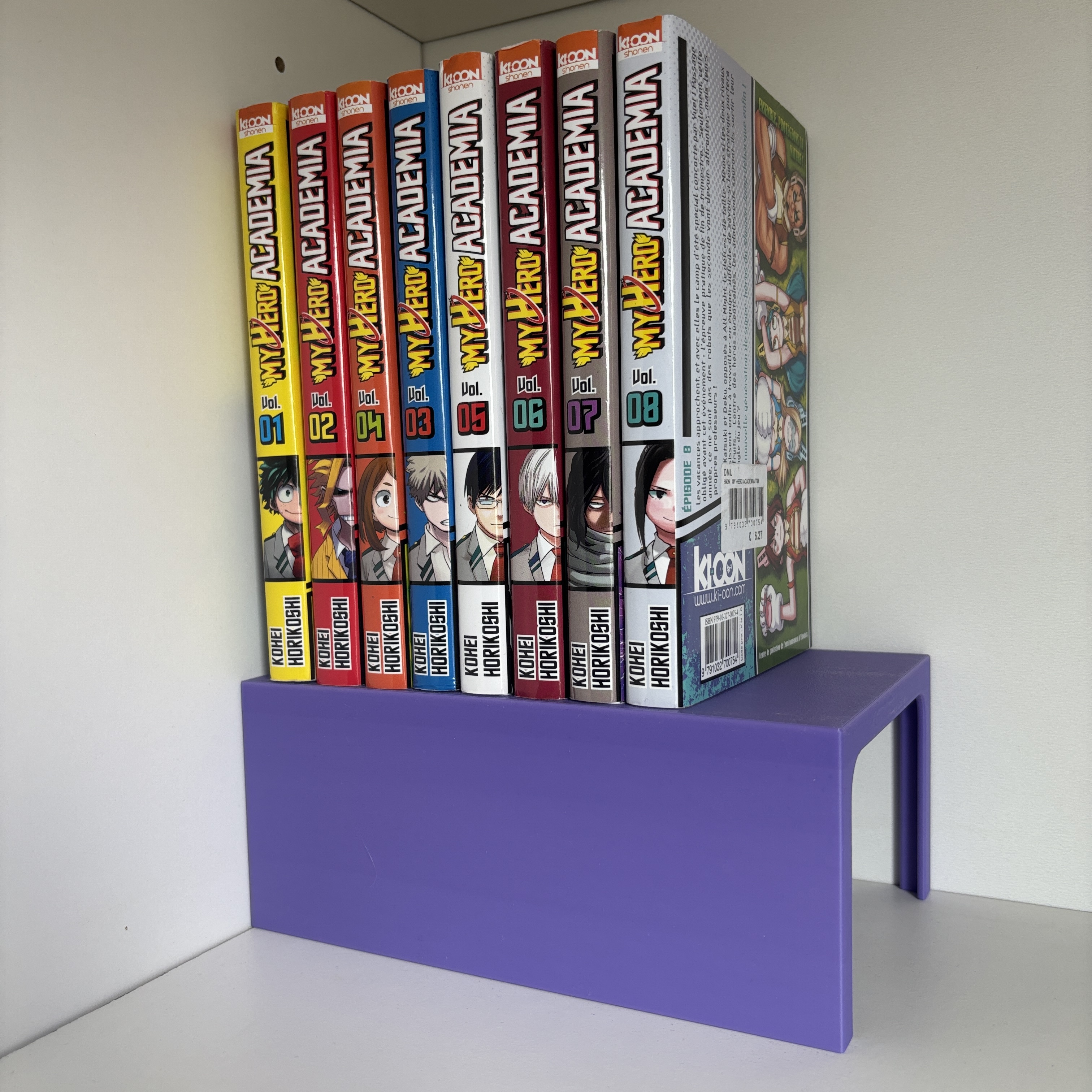 Réhausseur de livres sur étagère