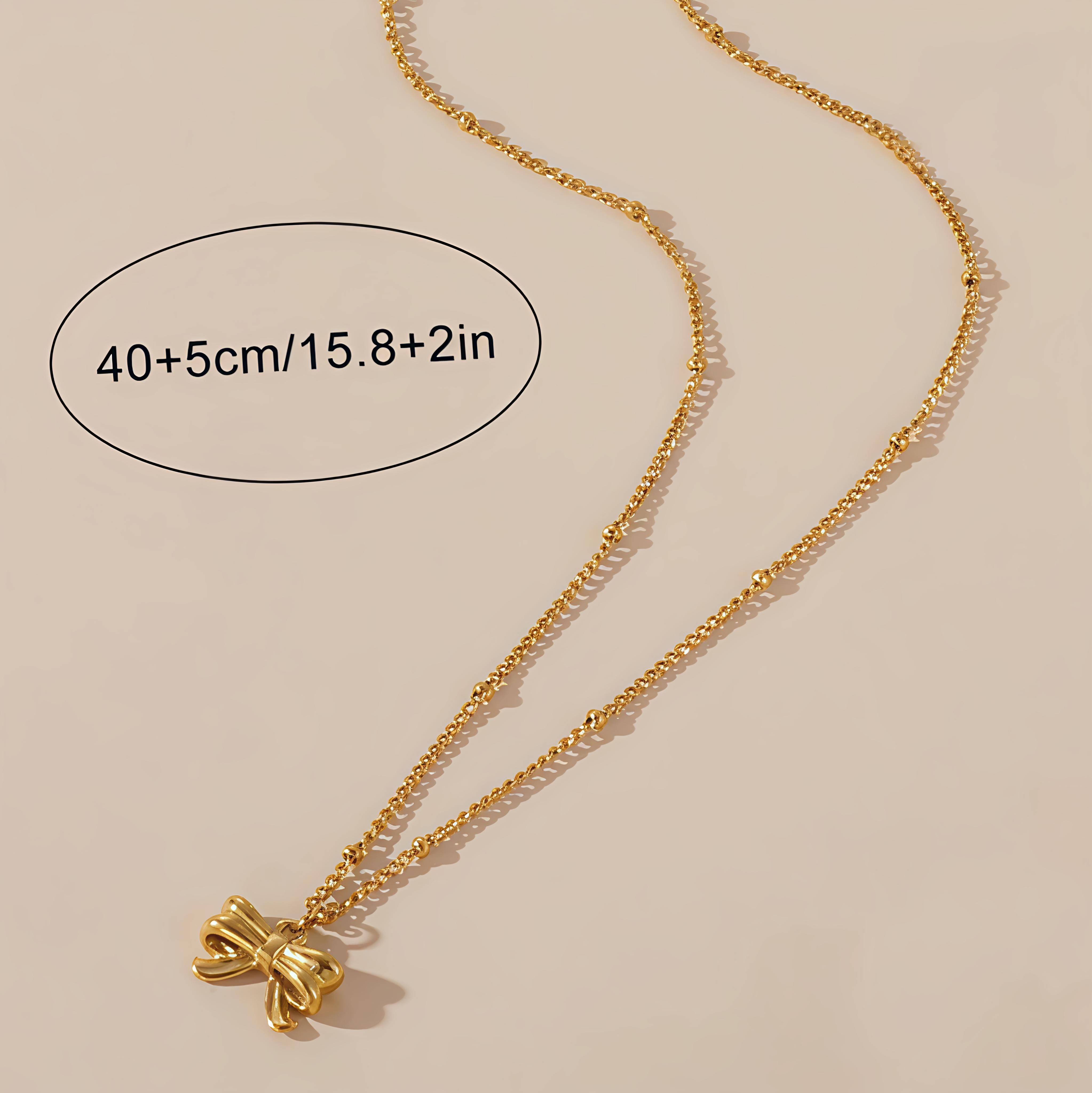 Gold Bow Pendant Necklace